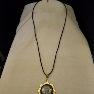 Brown Cord Adjustable Necklace with Silver Butterfly Set in Brown Epoxy on Gold Flower Pendant