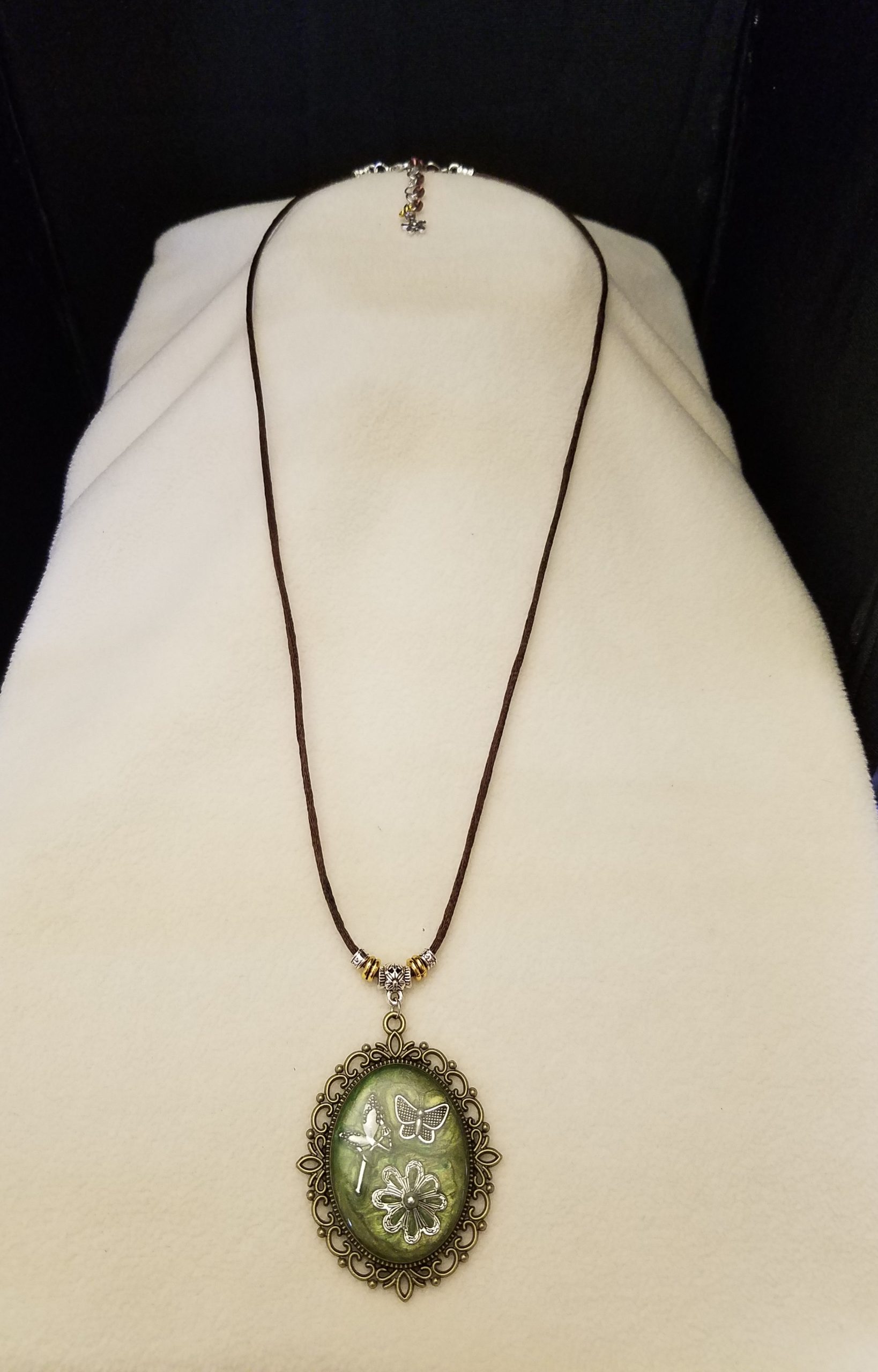 Brown Cord Beaded Adjustable Necklace with Silver Fairy, Butterfly & Flower Set in Green Epoxy on Decorative Antique Gold Pendant