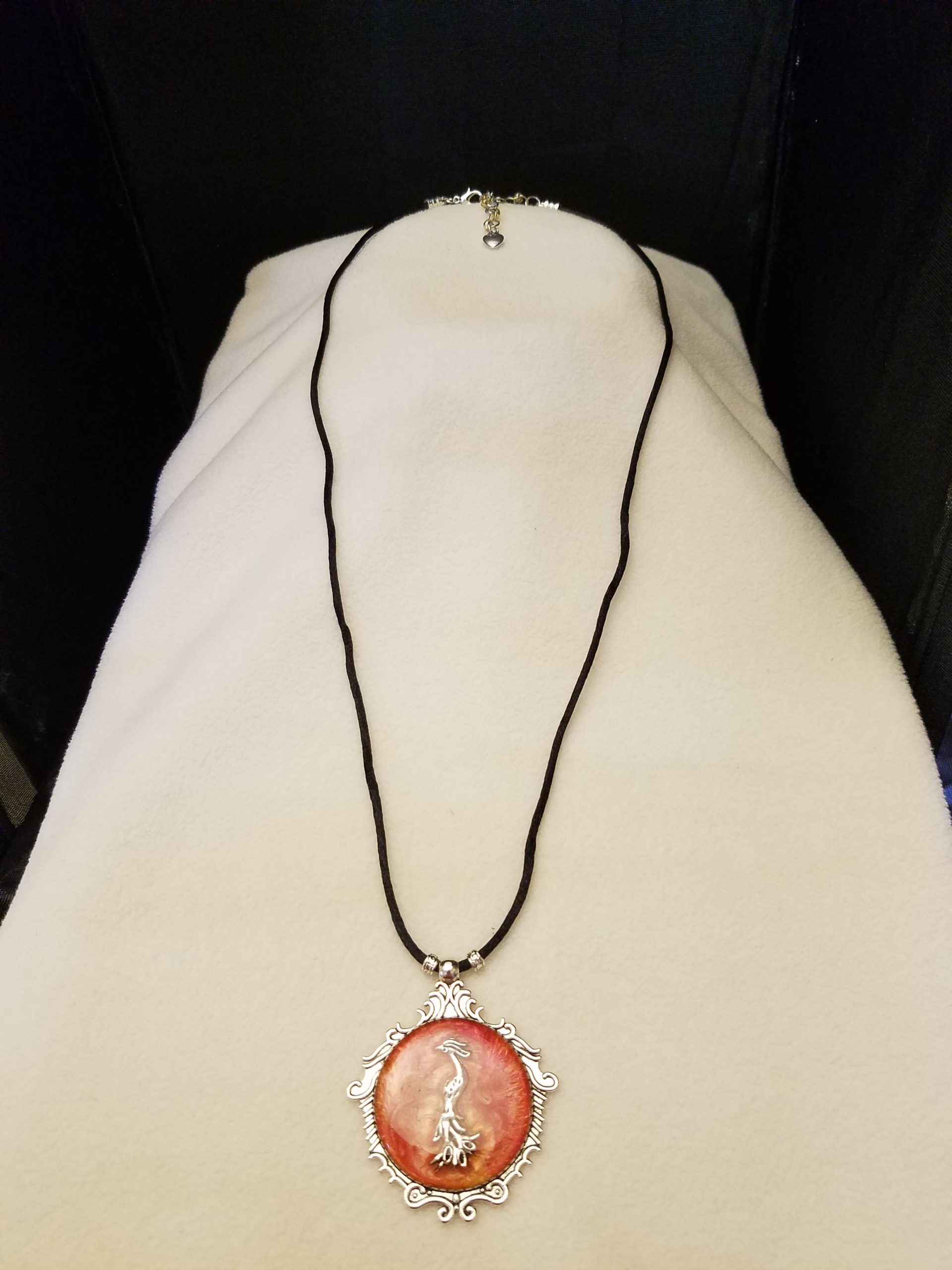 Black Cord Beaded Adjustable Necklace with Silver Phoenix Set in Orange Swirled Epoxy on Decorative Silver Pendant