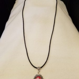 Adjustable Black Cord Necklace with a Silver Ladybug in Red Epoxy on Decorative Flower Pendant