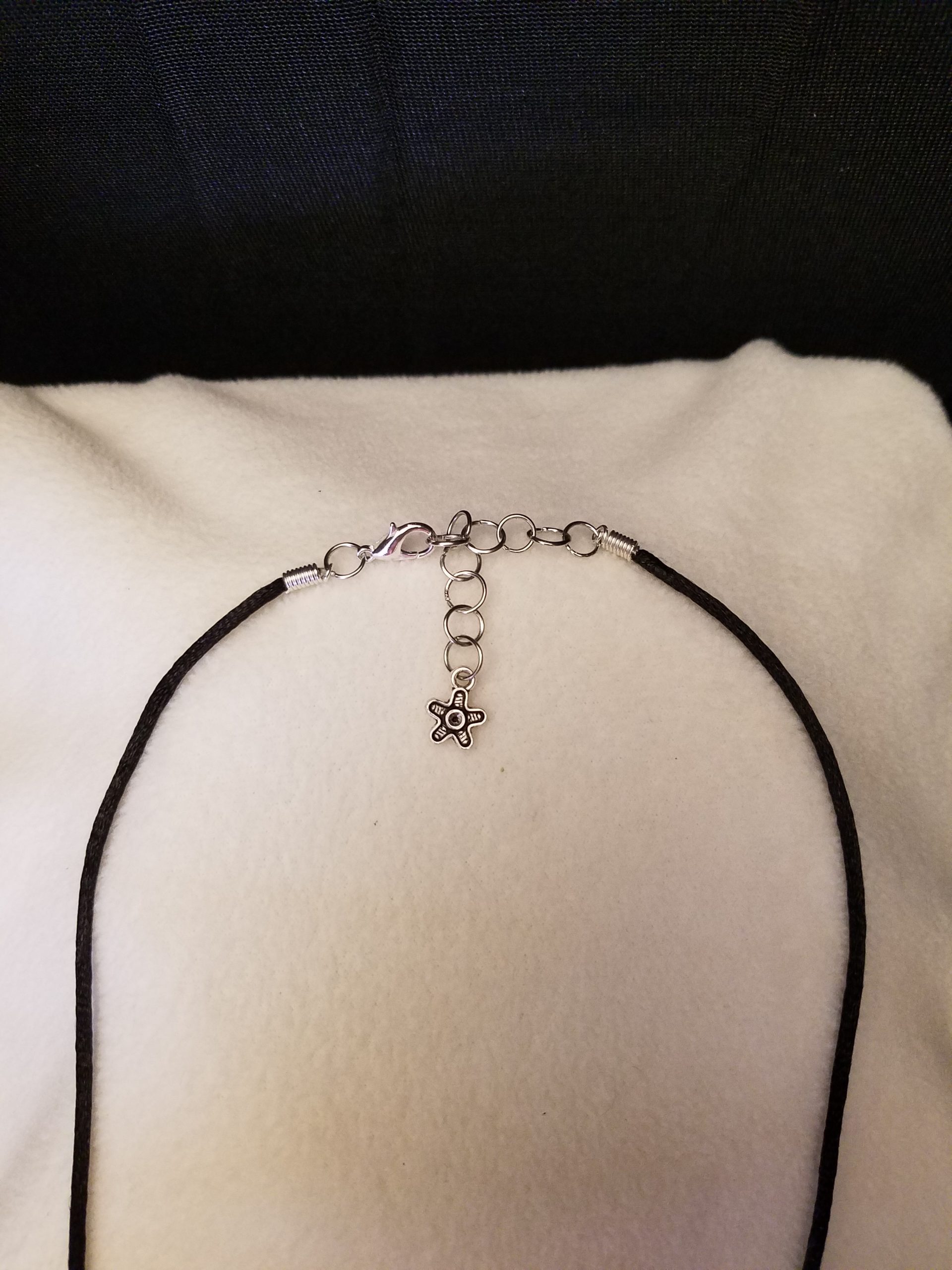Silver Chain Adjustment & Clasp on Black Cord Necklace with Flower Counterweight