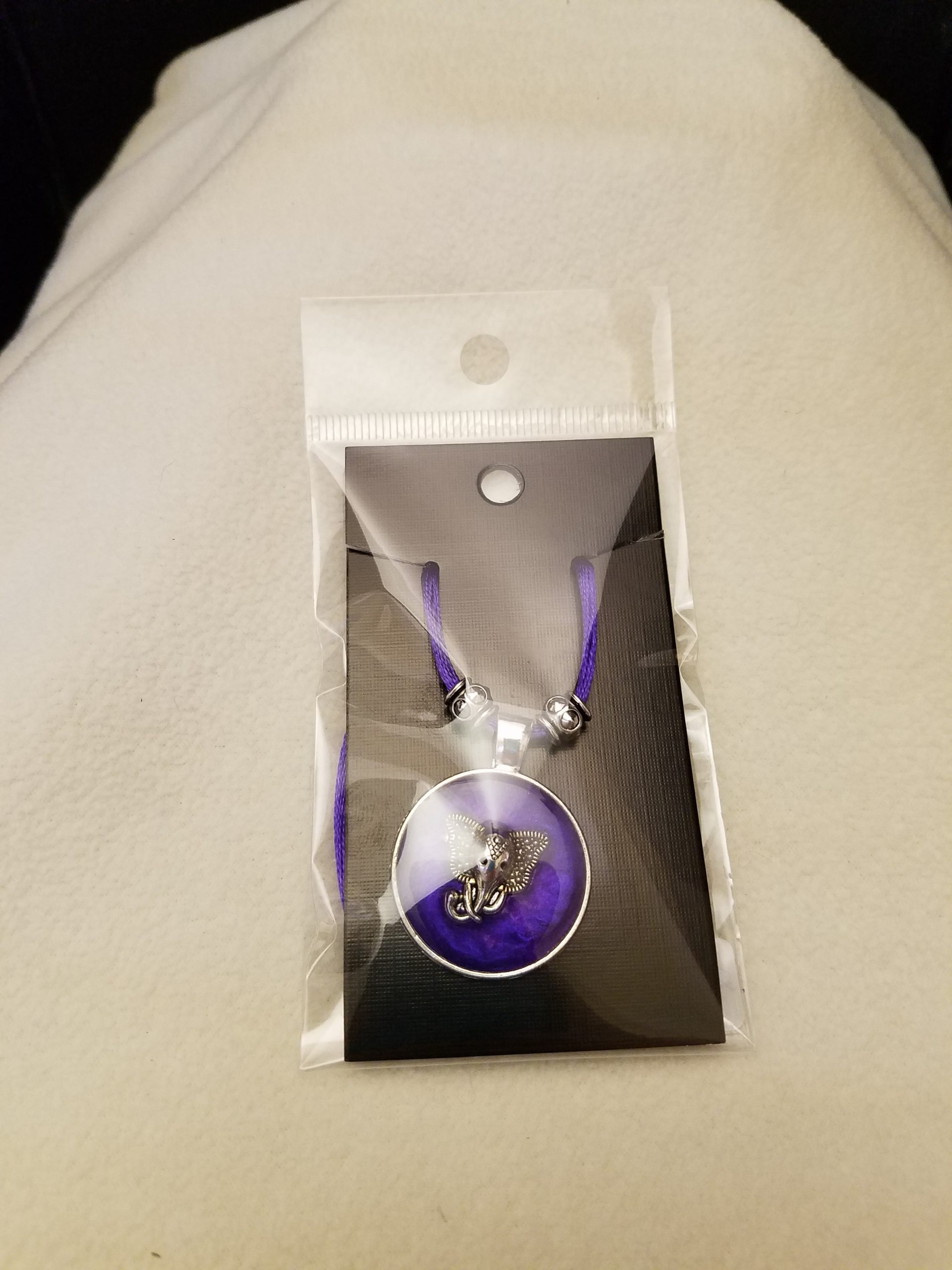 Beaded Adjustable Purple Cord Necklace with a Silver Elephant in Purple Epoxy on Round Silver Pendant
