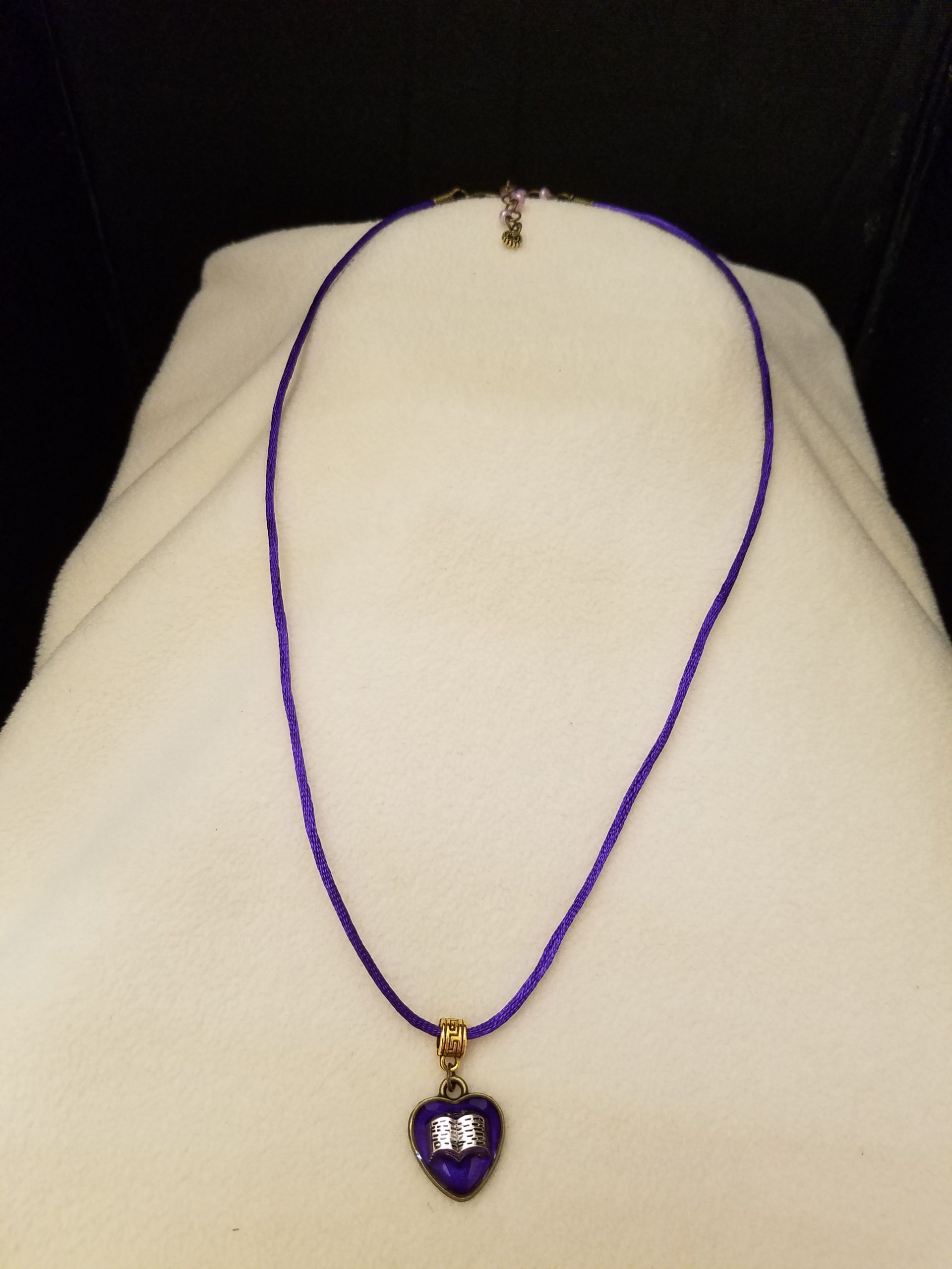 Black Cord Necklace with Purple Beaded Bronze Chain Adjustment with Silver Open Book Set in Purple Epoxy on a Bronze Heart Pendant