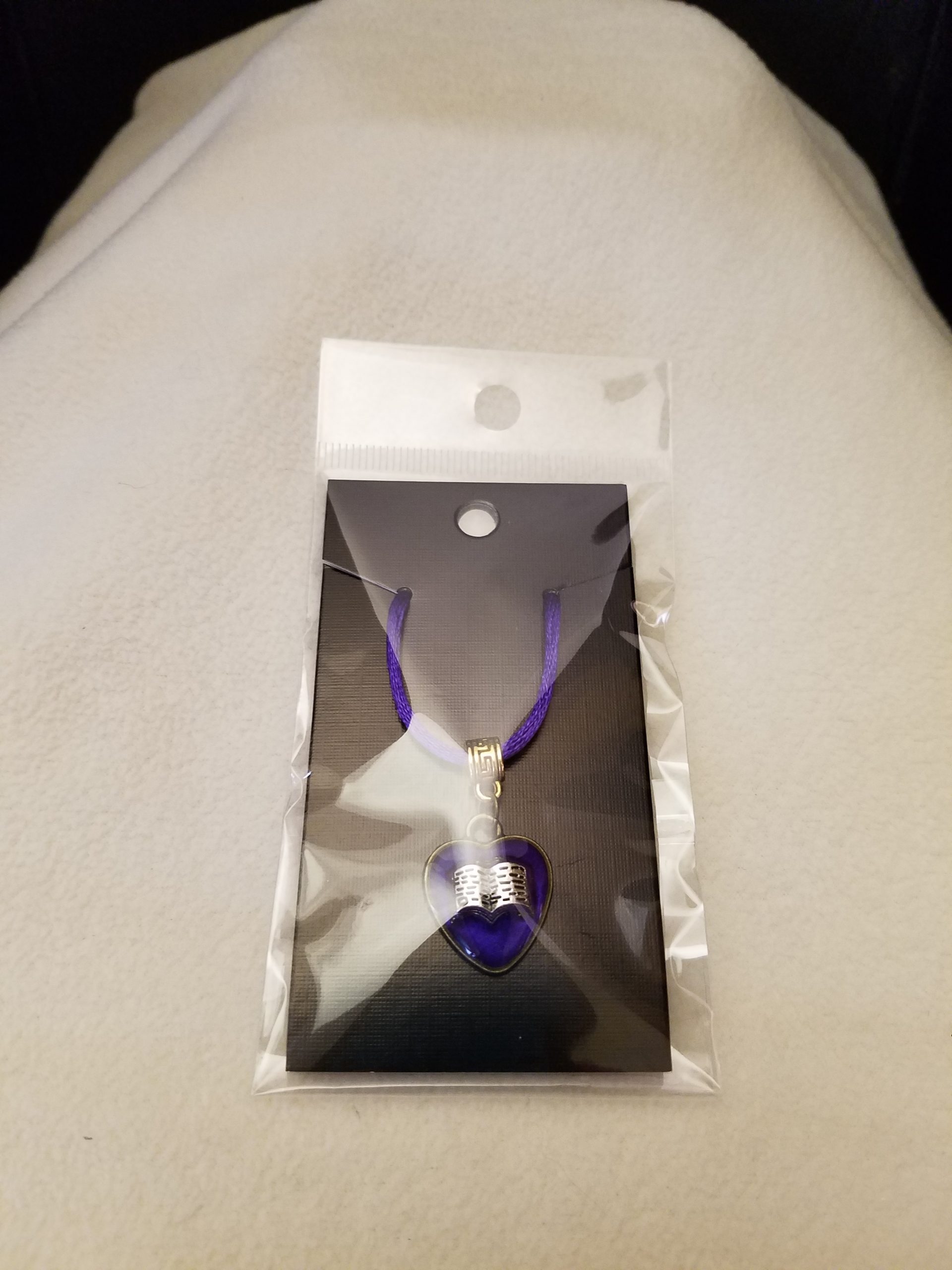 Black Cord Necklace with Purple Beaded Bronze Chain Adjustment with Silver Open Book Set in Purple Epoxy on a Bronze Heart Pendant