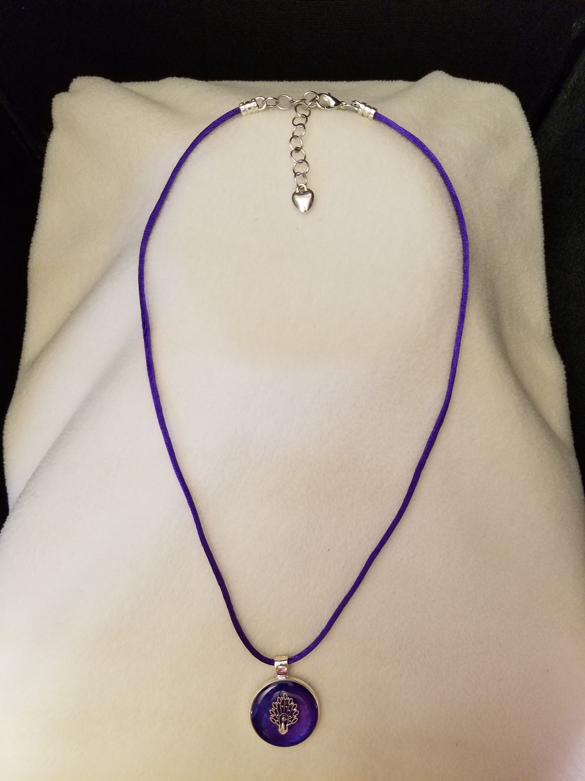 Adjustable Purple Cord Necklace with a Silver Peacock in Purple Epoxy on Round Silver Pendant