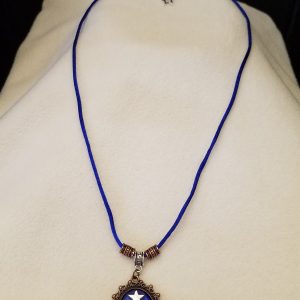 Beaded Blue Cord Necklace with Silver Chain Adjustment with Heart Counterweight & Silver Moon & Stars Set in Blue Epoxy on Decorative Bronze Pendant