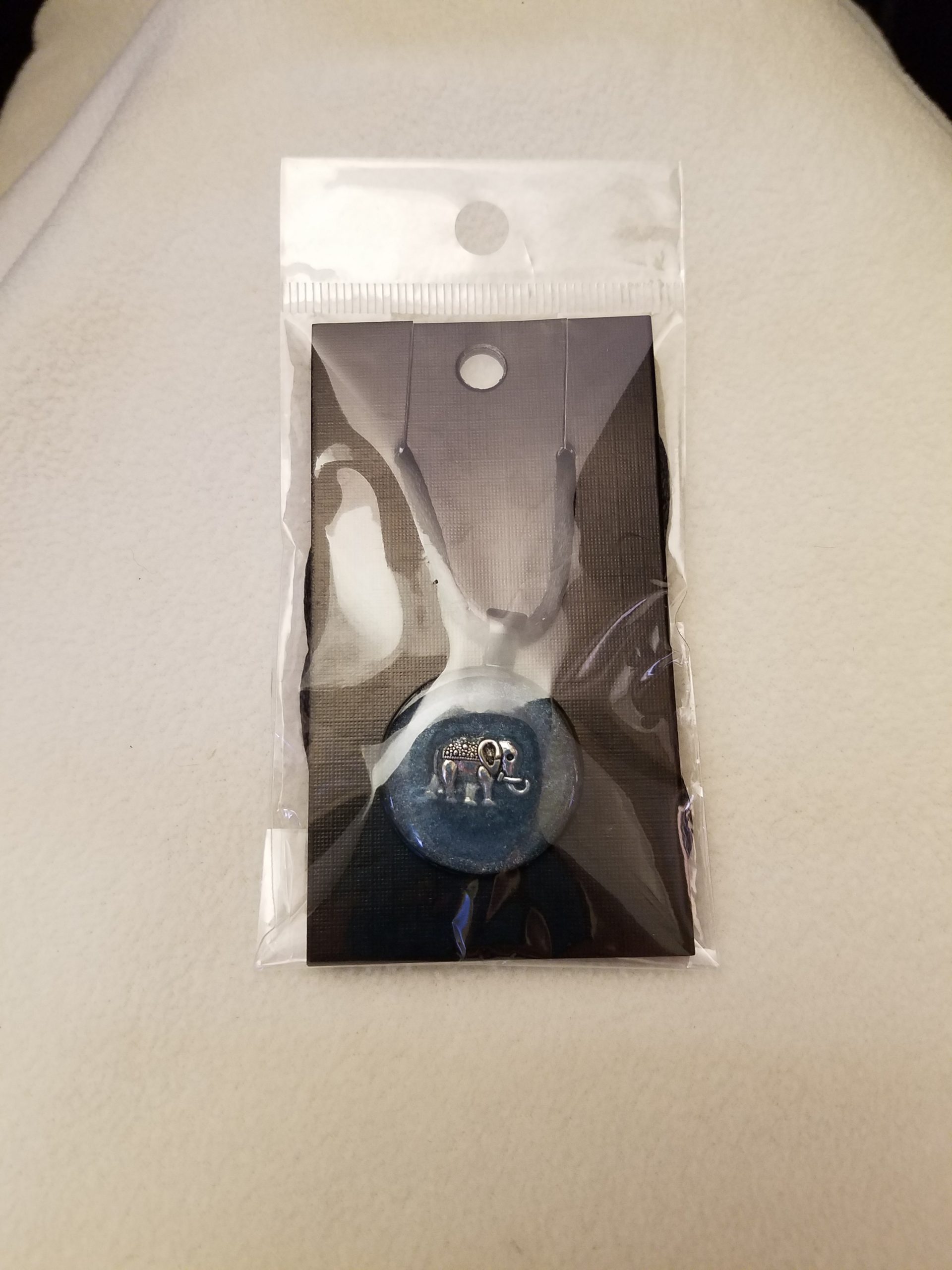 Adjustable Knotted Black Cord Necklace with Blue Epoxy Silver Elephant Round Black Pendant