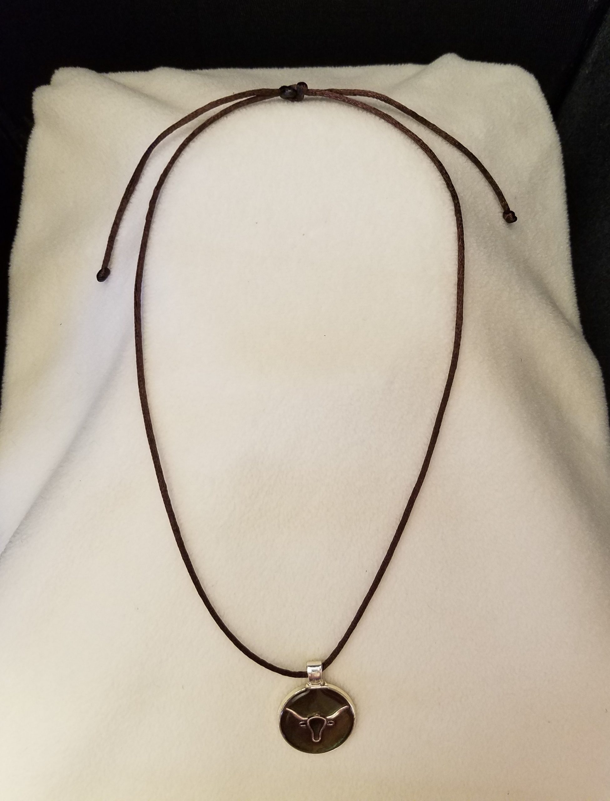 Adjustable Knotted Brown Cord Necklace with Brown Epoxy Silver Longhorn Steer Round Silver Pendant