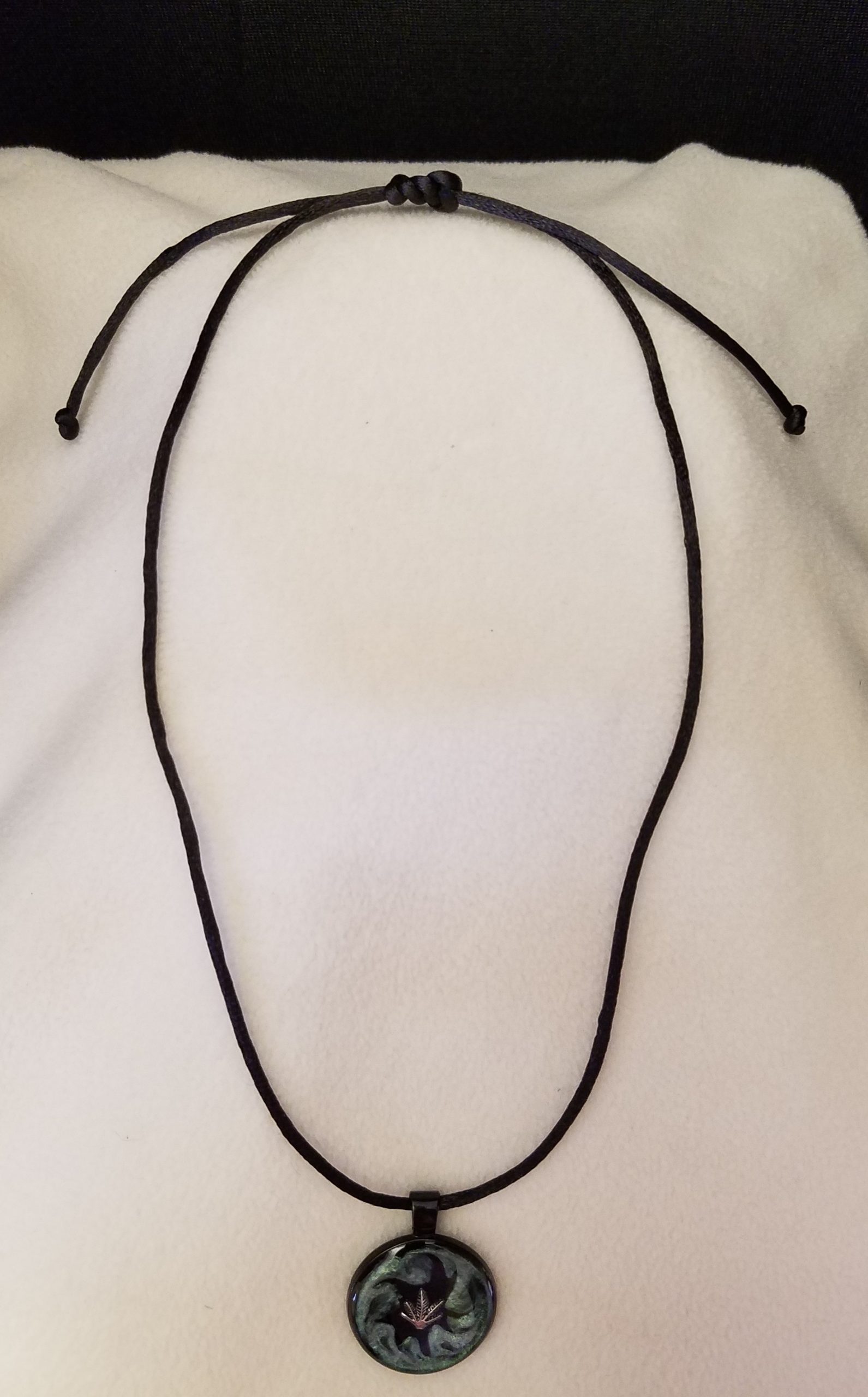 Adjustable Knotted Black Cord Necklace with Green Swirl Epoxy Silver Plant Leaf Round Black Pendant