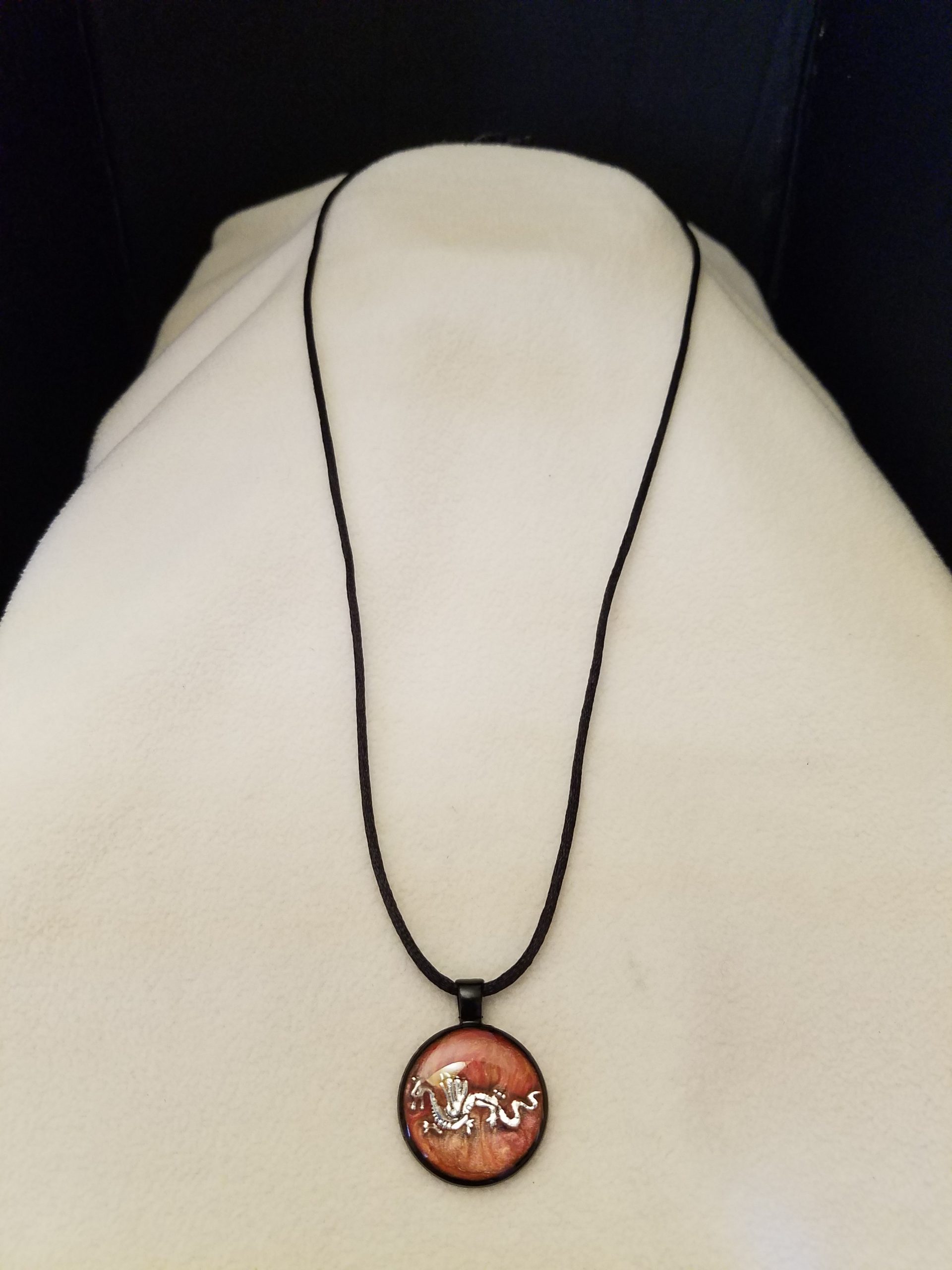 Adjustable Knotted Black Cord Necklace with Orange Swirl Epoxy Silver Dragon Round Black Pendant