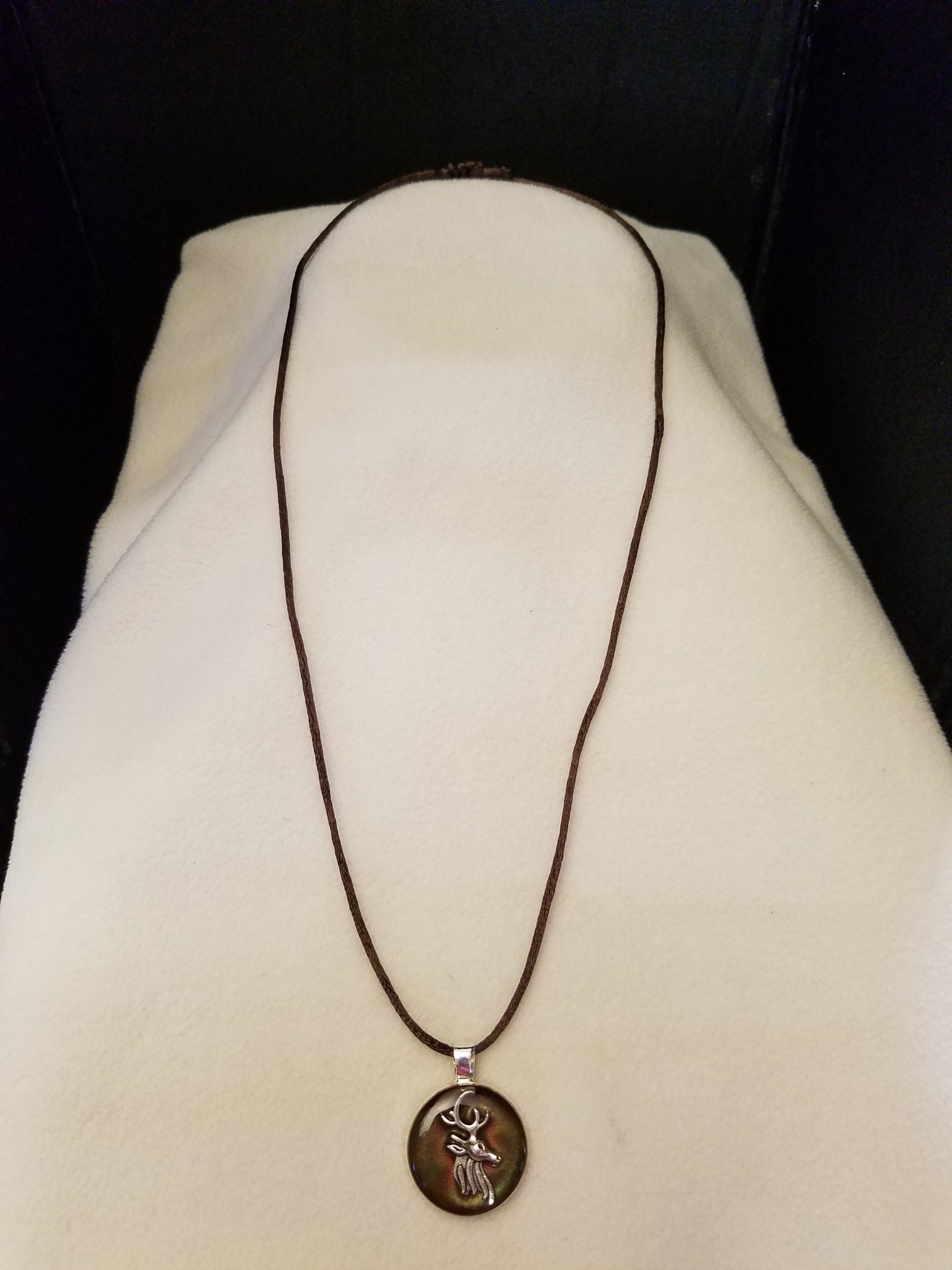 Adjustable Knotted Brown Cord Necklace with Brown Epoxy Silver Stag Head Round Silver Pendant