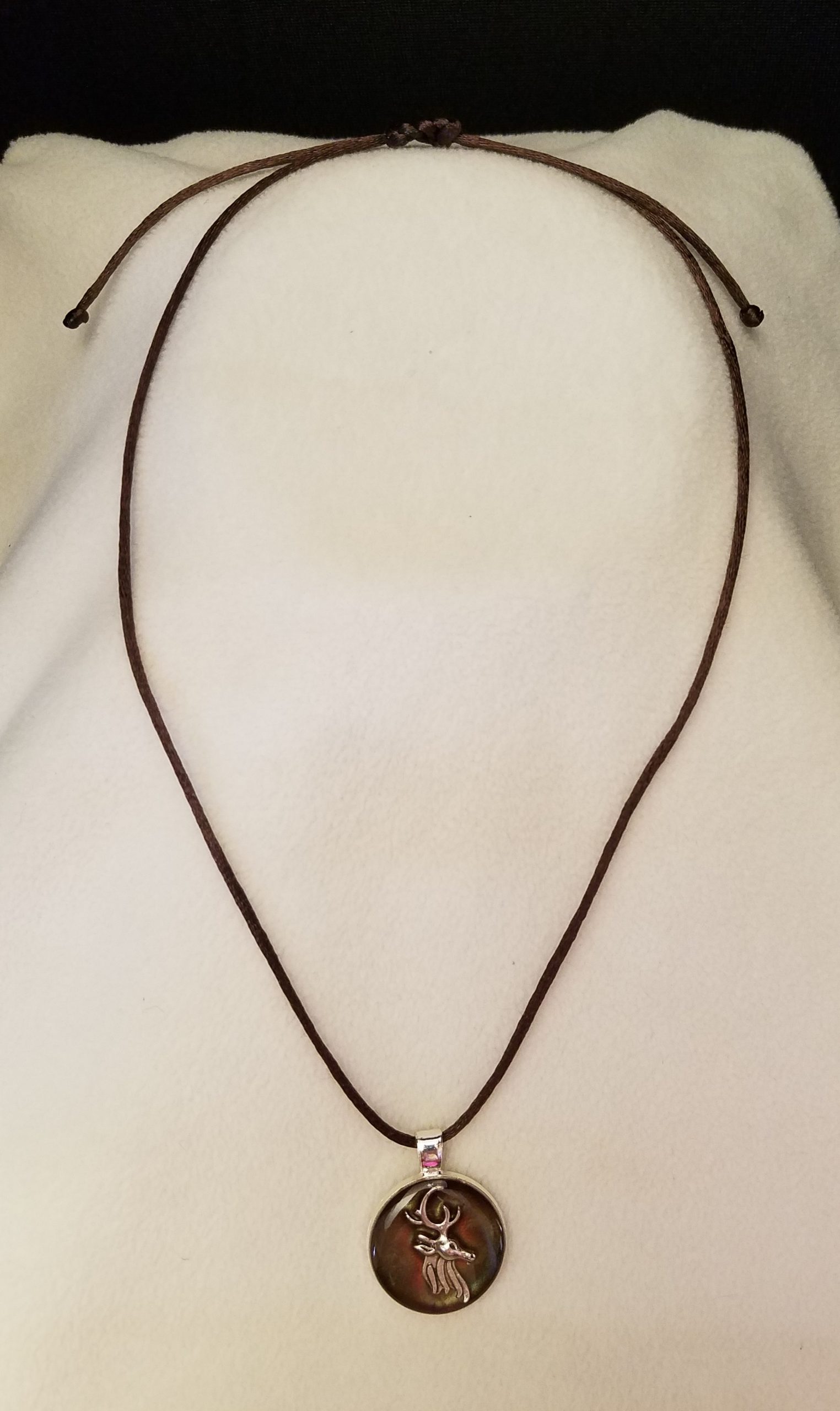 Adjustable Knotted Brown Cord Necklace with Brown Epoxy Silver Stag Head Round Silver Pendant