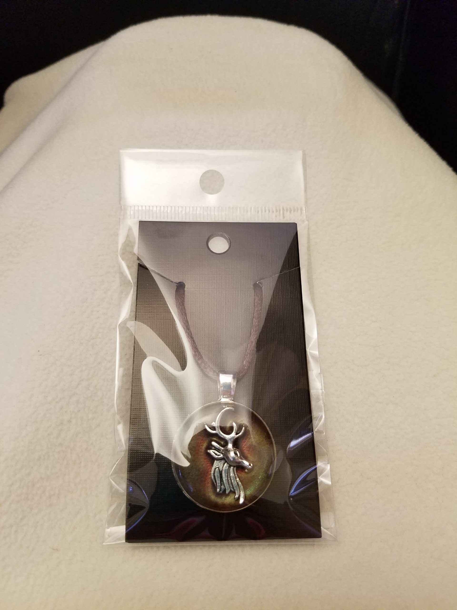 Adjustable Knotted Brown Cord Necklace with Brown Epoxy Silver Stag Head Round Silver Pendant