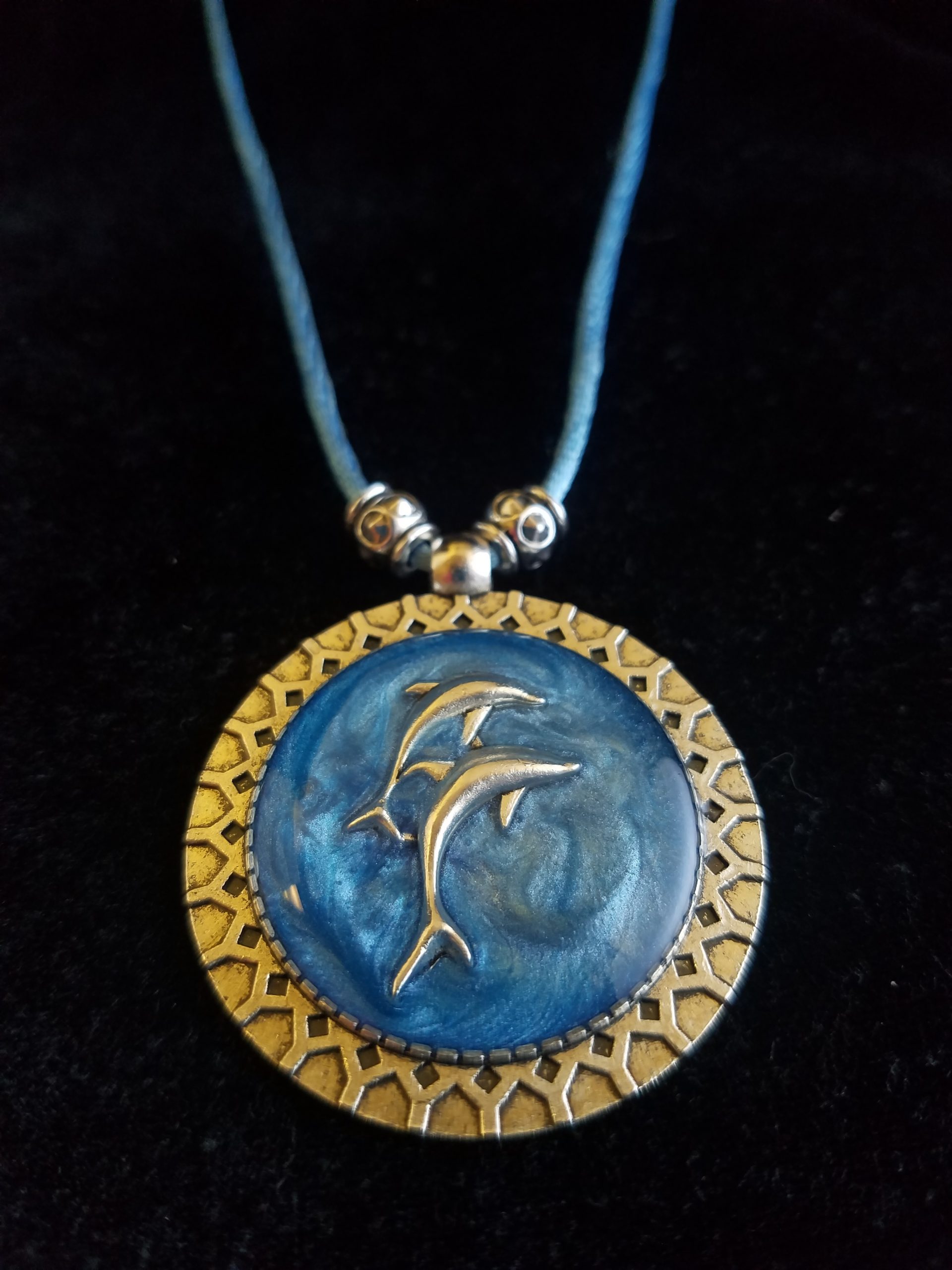Silver Dolphins Set in Blue Epoxy on Decorative Silver Pendant on Beaded Blue Cord Necklace