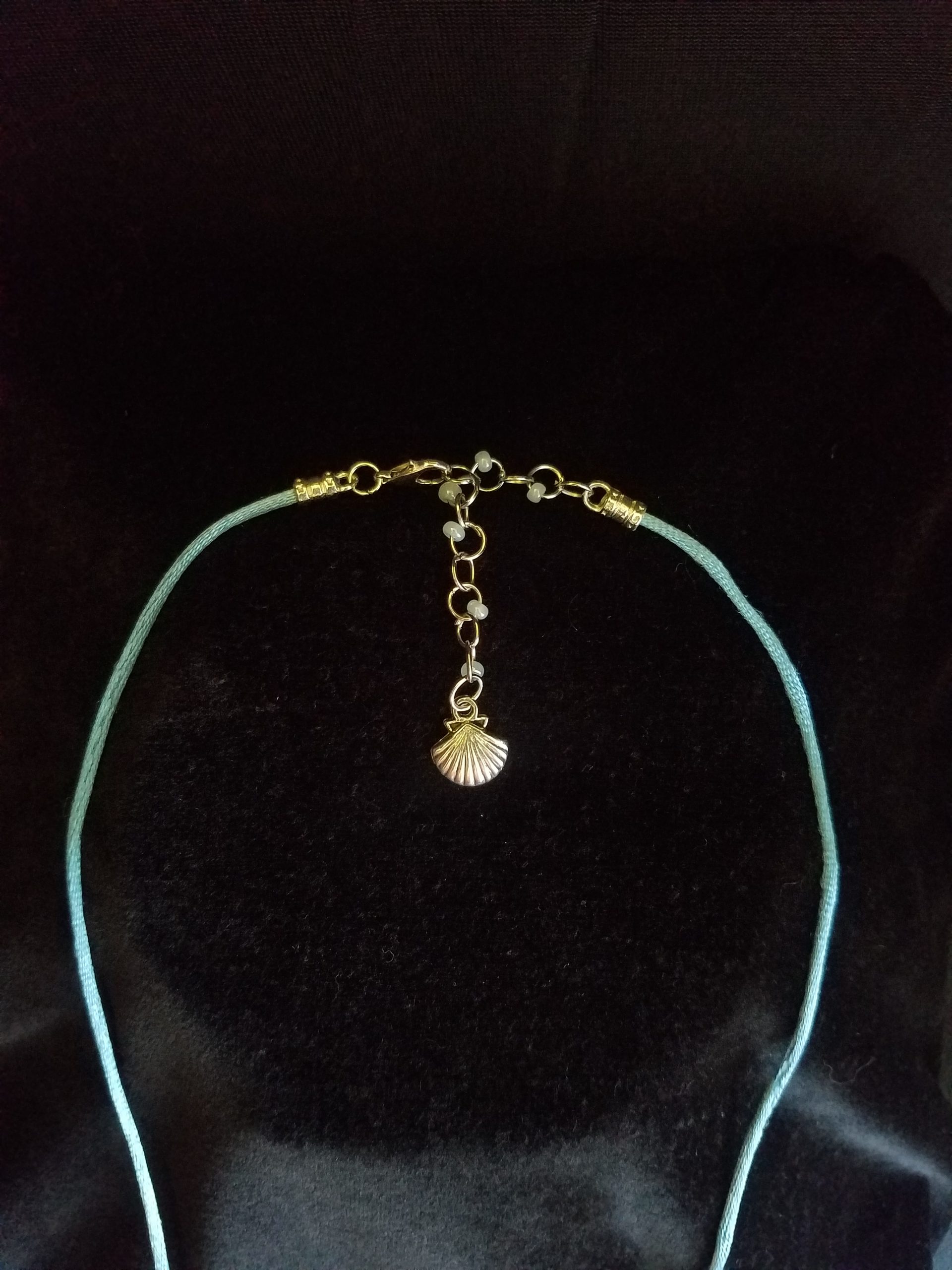 Clasp on Blue Cord Necklace with Seashell Counterweight