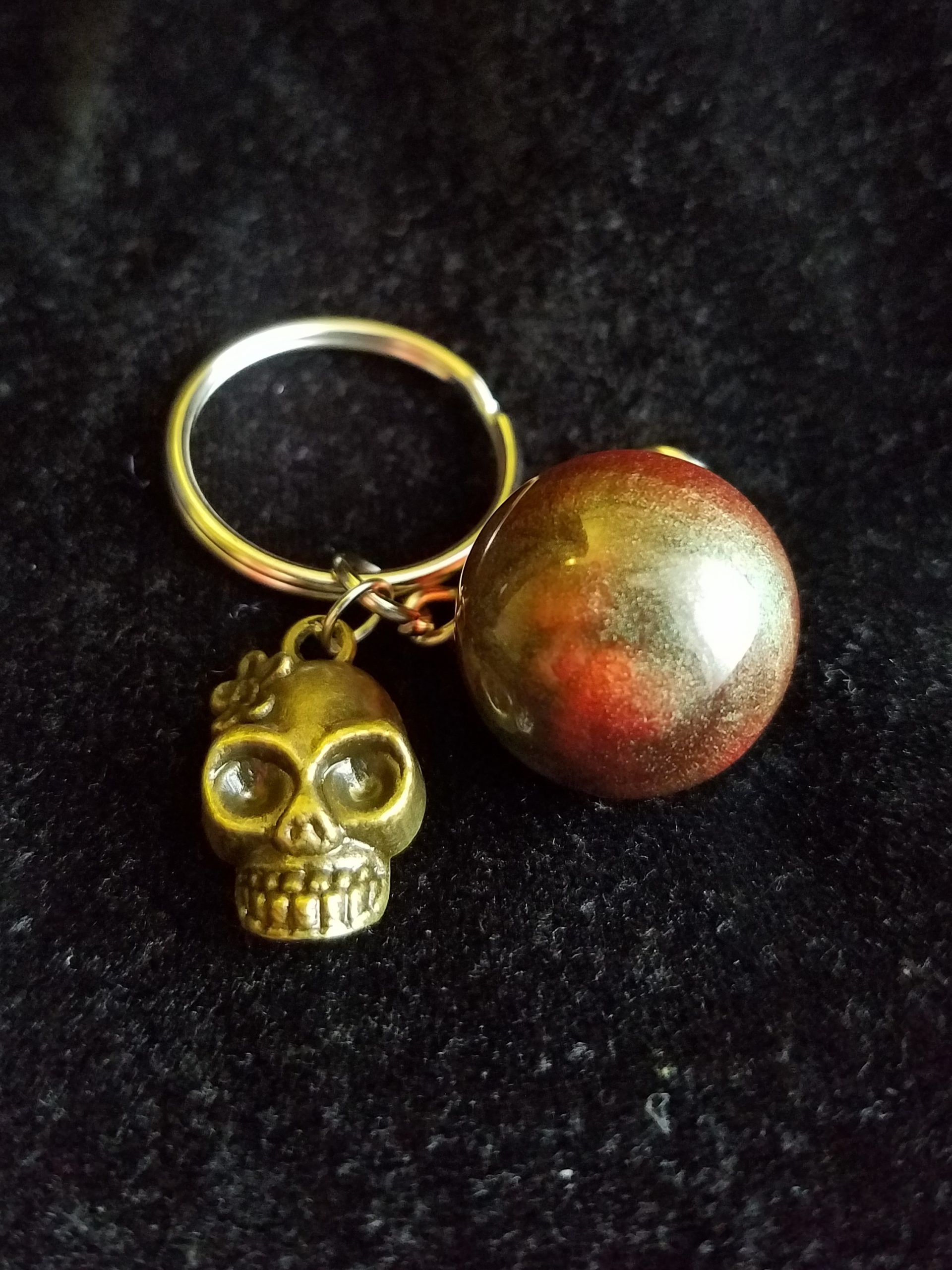 Abstract Brown & Clear Egg Keychain with Bronze Girl Skull Charm