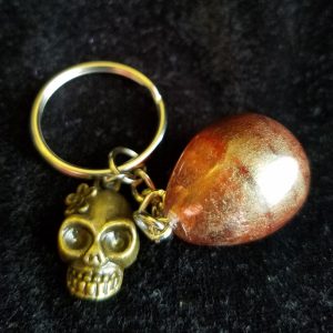 Abstract Brown & Clear Egg Keychain with Bronze Girl Skull Charm