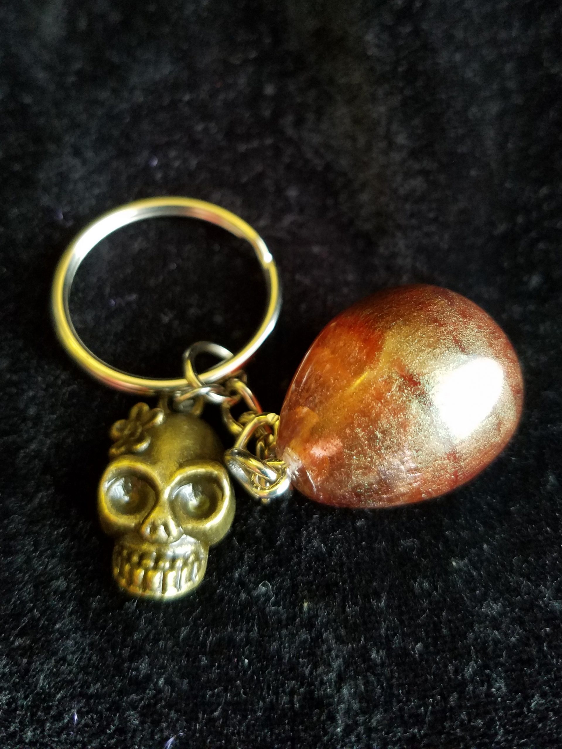 Abstract Brown & Clear Egg Keychain with Bronze Girl Skull Charm