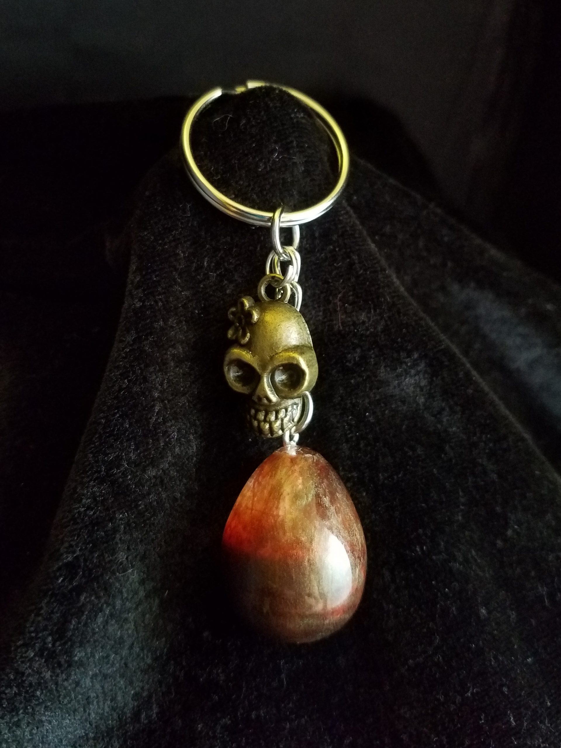 Abstract Brown & Clear Egg Keychain with Bronze Girl Skull Charm