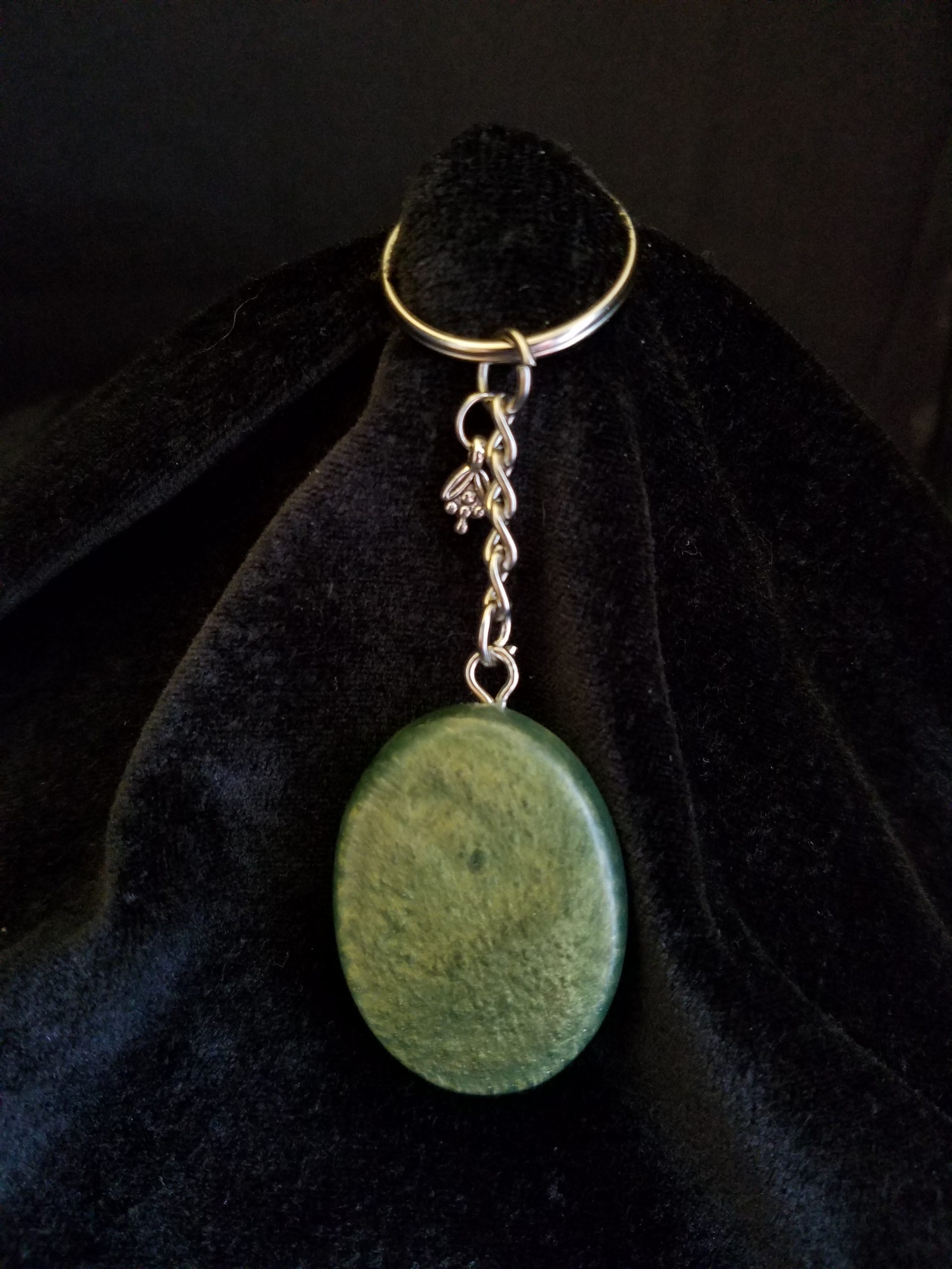 Oval Pendant Keychain Filled with Purple Flower Bouquet in Clear Glitter and Green Epoxy with Silver Flower Charm