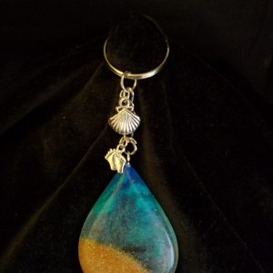 Beach Theme Teardrop Pendant Keychain Filled with Brown Glitter Sand, Triple Blue & Clear Epoxy with Silver Seashell & Feet Charms