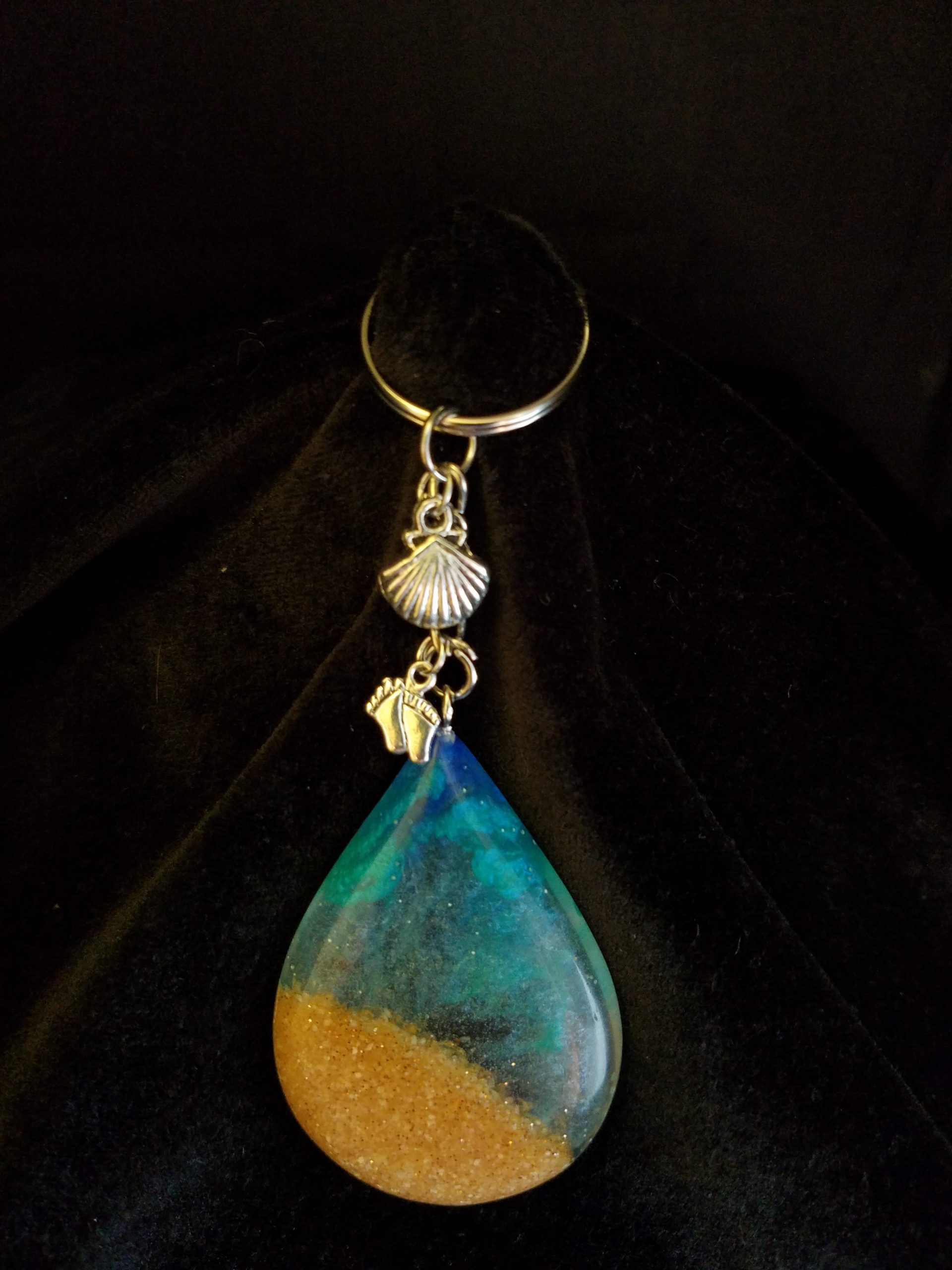 Beach Theme Teardrop Pendant Keychain Filled with Brown Glitter Sand, Triple Blue & Clear Epoxy with Silver Seashell & Feet Charms
