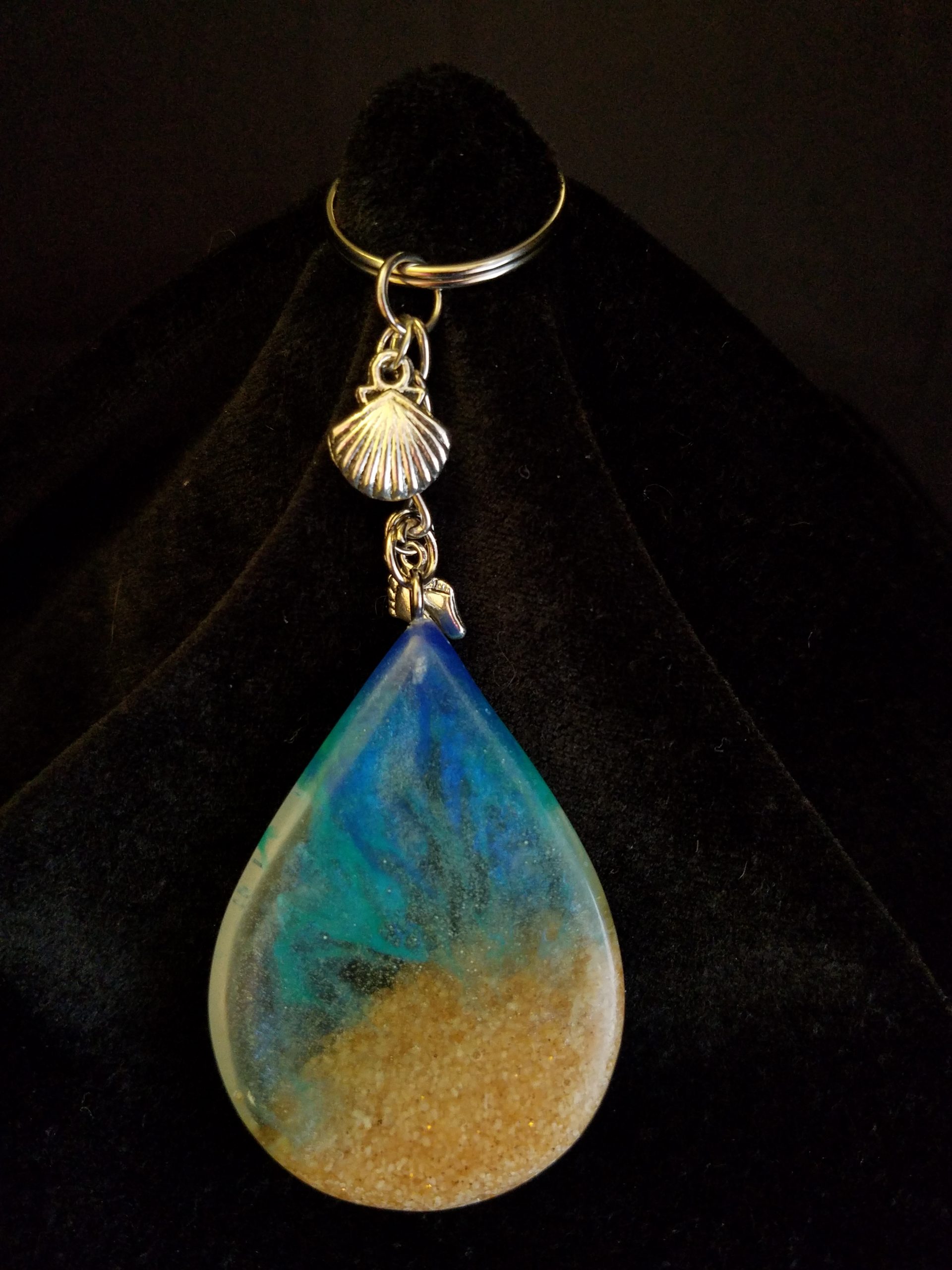 Beach Theme Teardrop Pendant Keychain Filled with Brown Glitter Sand, Triple Blue & Clear Epoxy with Silver Seashell & Feet Charms