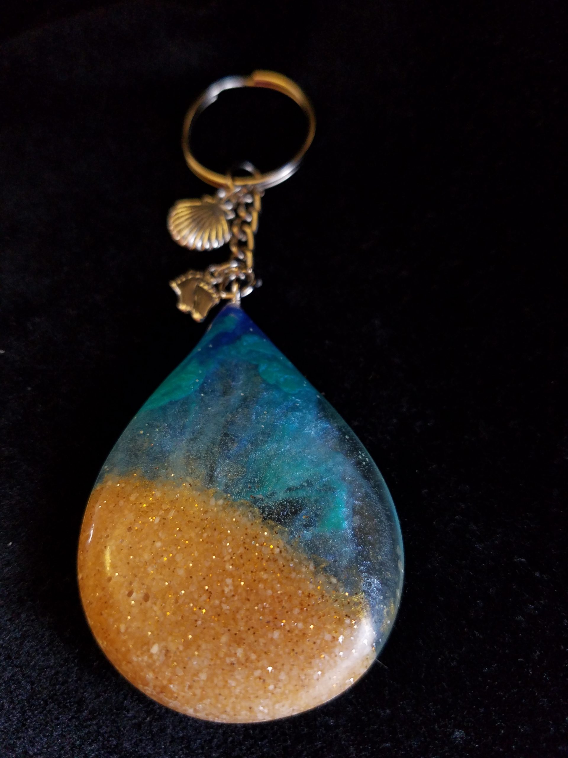 Beach Theme Teardrop Pendant Keychain Filled with Brown Glitter Sand, Triple Blue & Clear Epoxy with Silver Seashell & Feet Charms