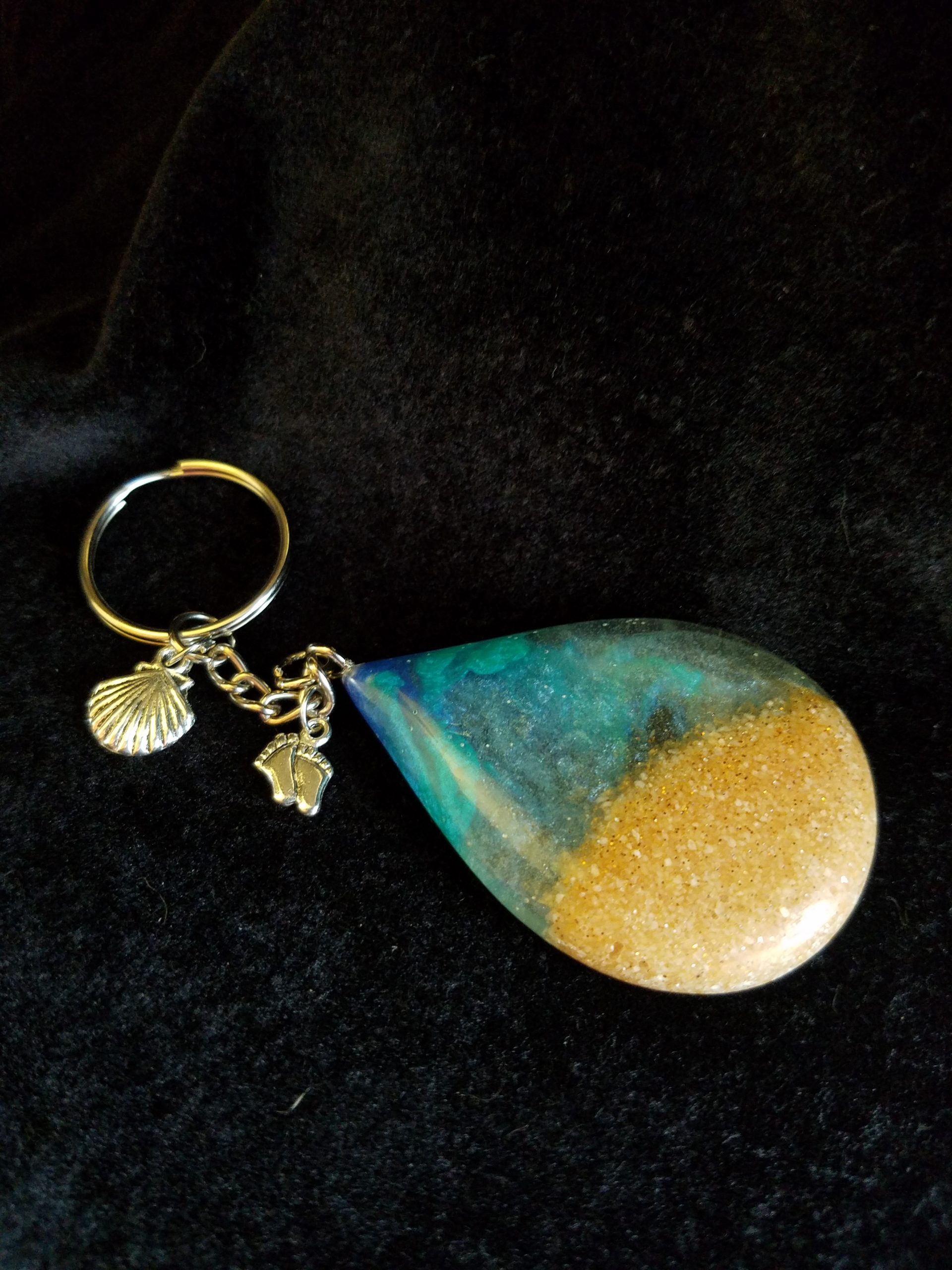 Beach Theme Teardrop Pendant Keychain Filled with Brown Glitter Sand, Triple Blue & Clear Epoxy with Silver Seashell & Feet Charms