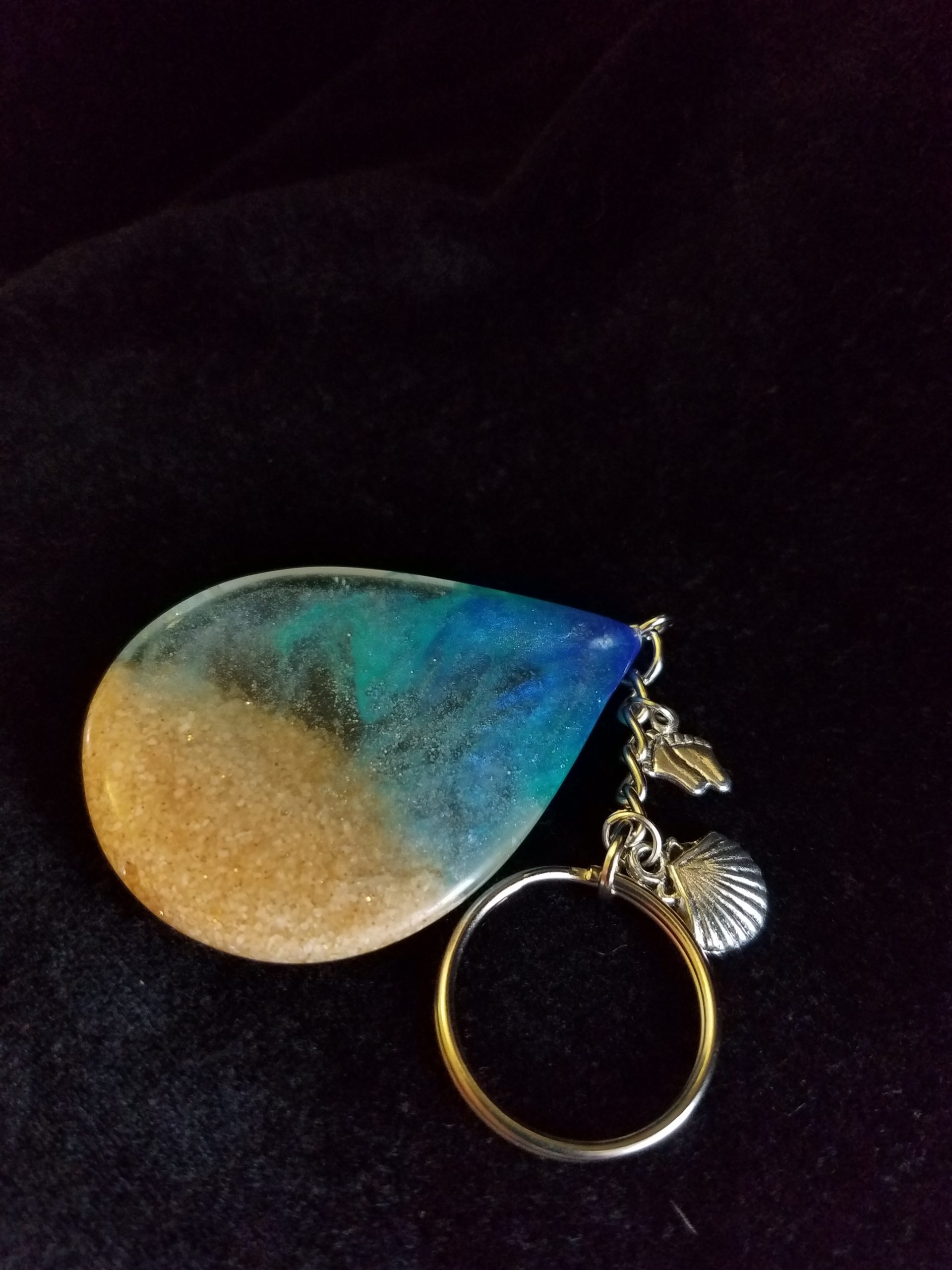 Beach Theme Teardrop Pendant Keychain Filled with Brown Glitter Sand, Triple Blue & Clear Epoxy with Silver Seashell & Feet Charms