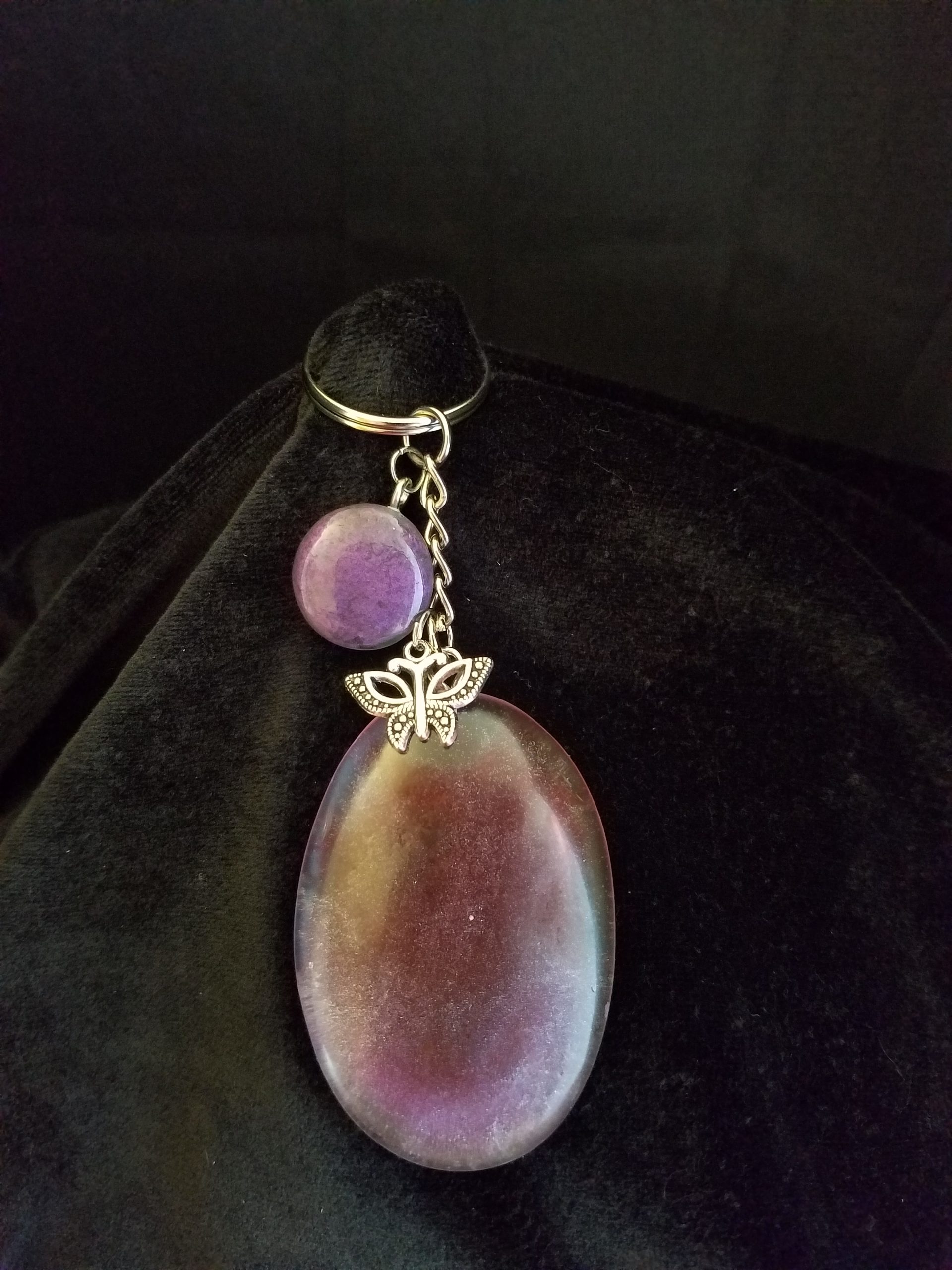Abstract Clear Purple & Red Shimmery Oval Epoxy Pendant Keychain with Butterfly
