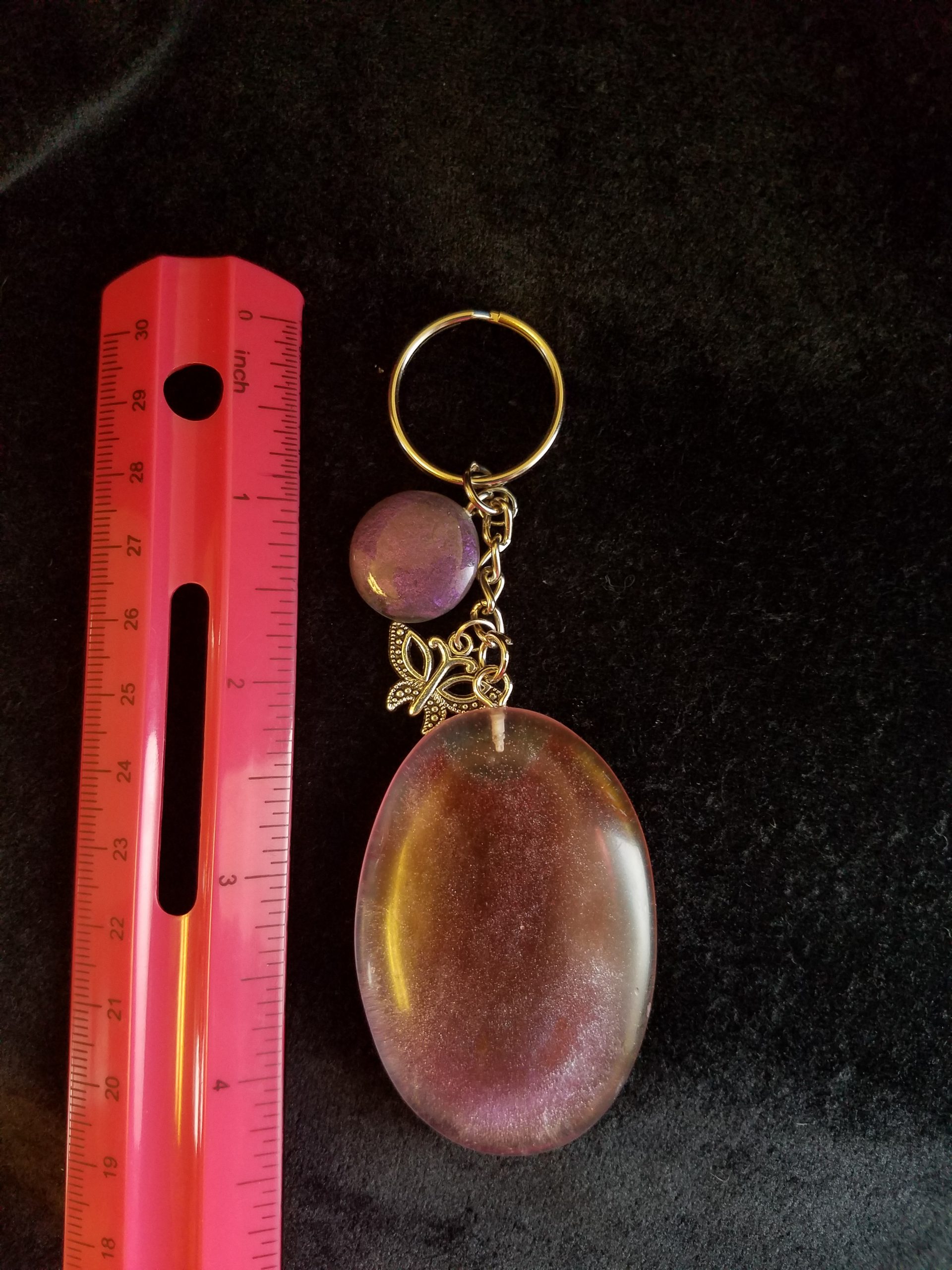 Abstract Clear Purple & Red Shimmery Oval Epoxy Pendant Keychain with Butterfly