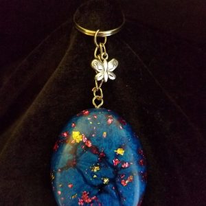 Abstract Shimmery Blue Oval Epoxy Pendant Keychain with Gold & Pink Foil Flakes & Silver Butterfly Charm