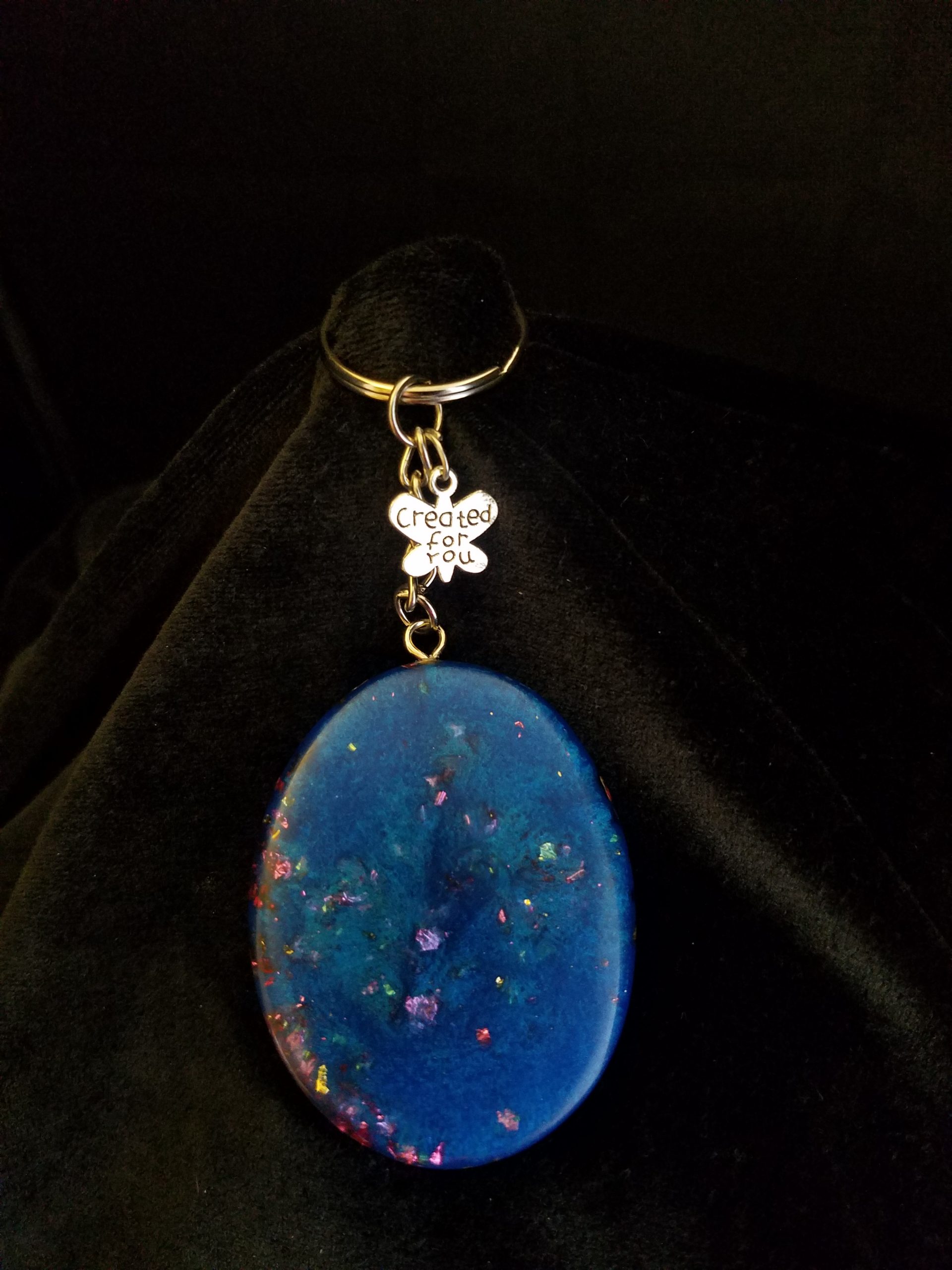 Abstract Shimmery Blue Oval Epoxy Pendant Keychain with Gold & Pink Foil Flakes & Silver Butterfly Charm