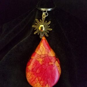 Abstract Red, Orange & Yellow Fire Swirl Teardrop Epoxy Pendant Keychain With Gold Sun Charm
