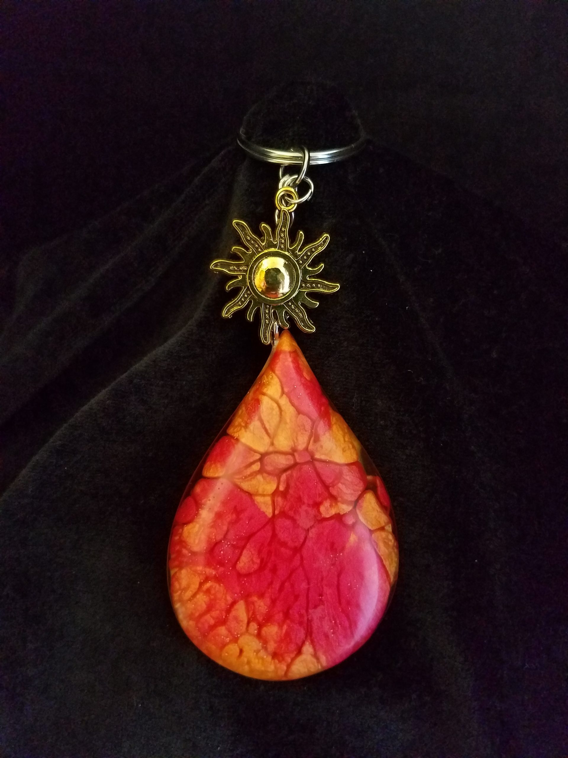 Abstract Red, Orange & Yellow Fire Swirl Teardrop Epoxy Pendant Keychain With Gold Sun Charm