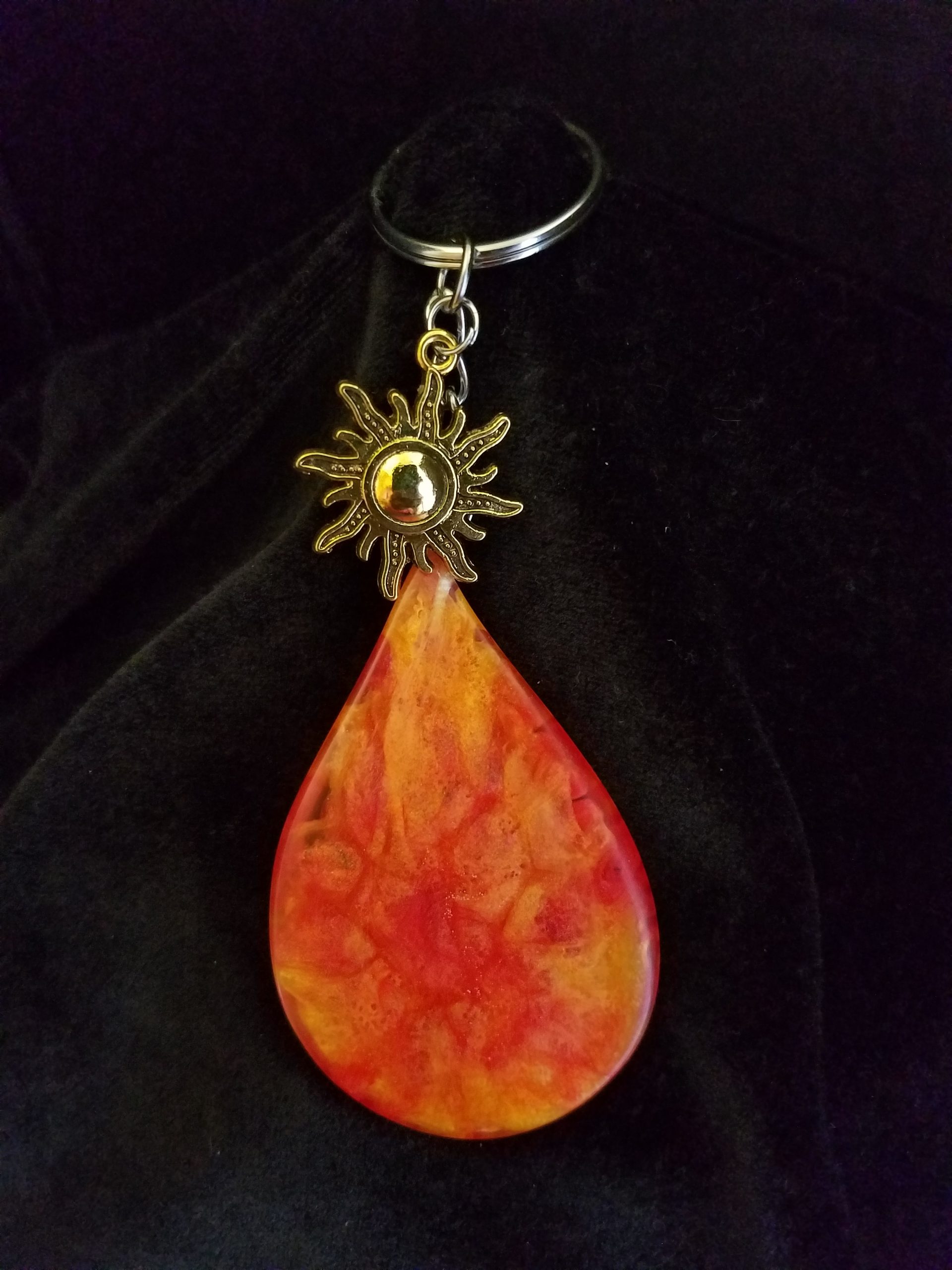Abstract Red, Orange & Yellow Fire Swirl Teardrop Epoxy Pendant Keychain With Gold Sun Charm