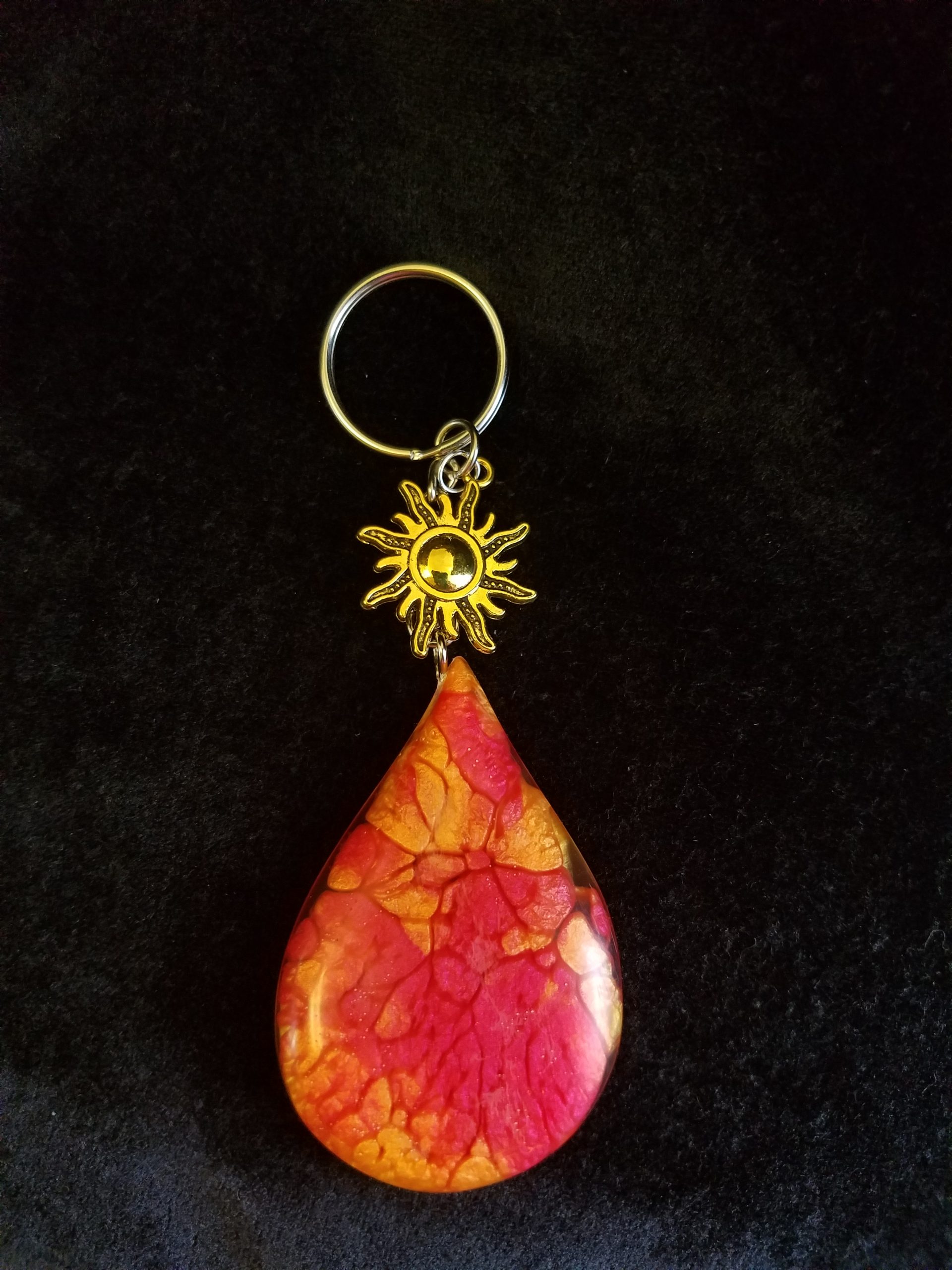 Abstract Red, Orange & Yellow Fire Swirl Teardrop Epoxy Pendant Keychain With Gold Sun Charm