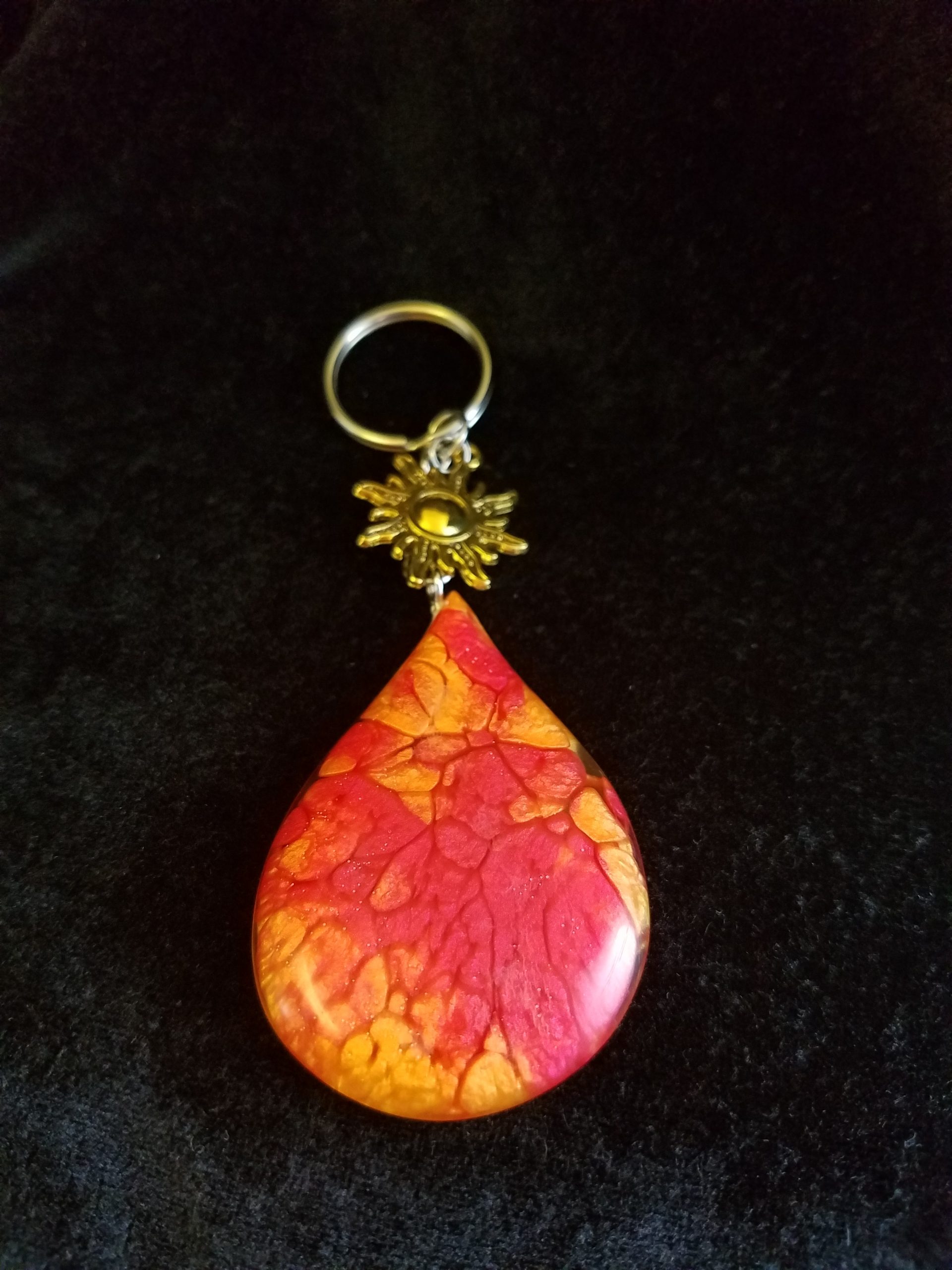 Abstract Red, Orange & Yellow Fire Swirl Teardrop Epoxy Pendant Keychain With Gold Sun Charm