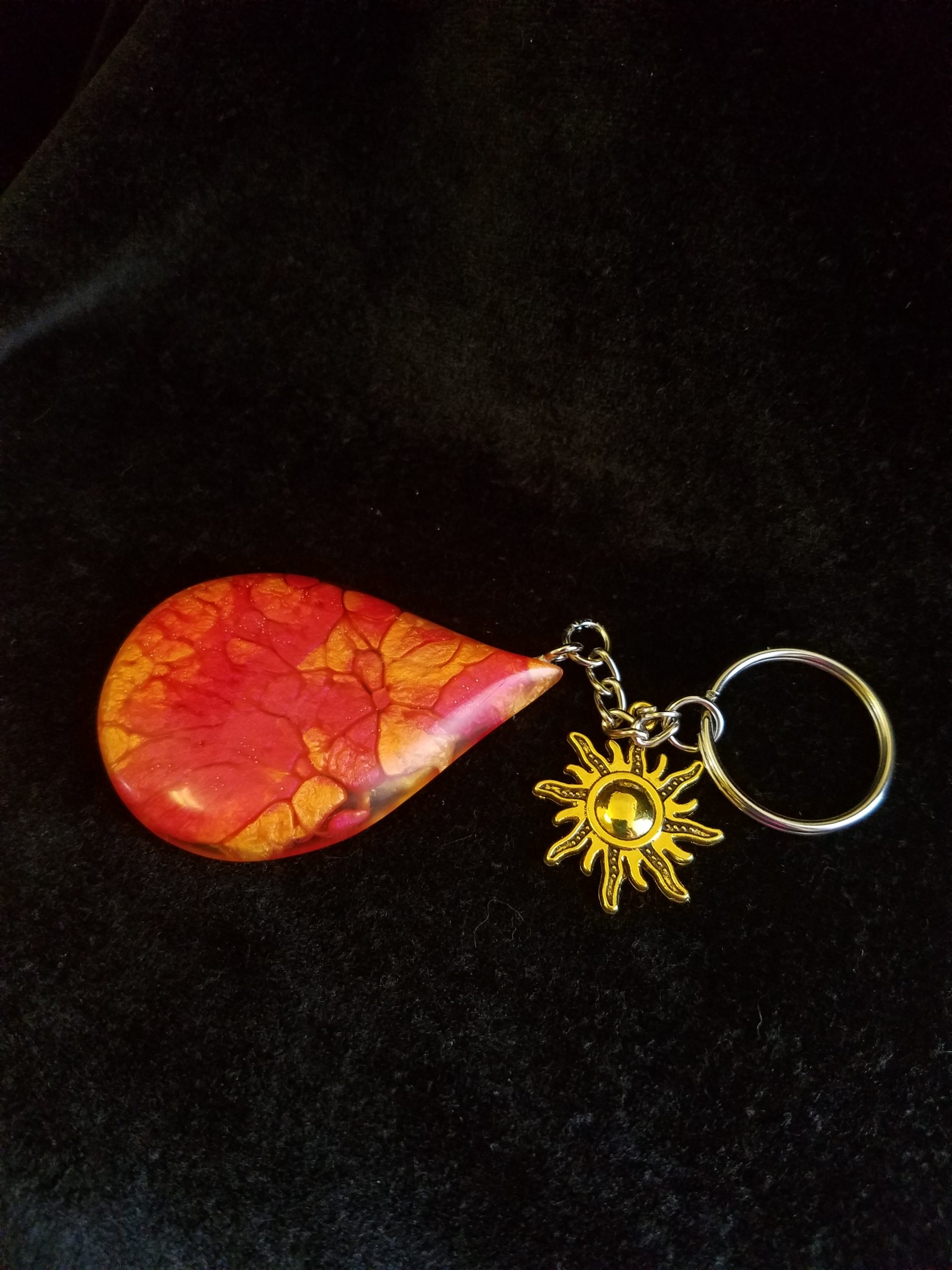 Abstract Red, Orange & Yellow Fire Swirl Teardrop Epoxy Pendant Keychain With Gold Sun Charm