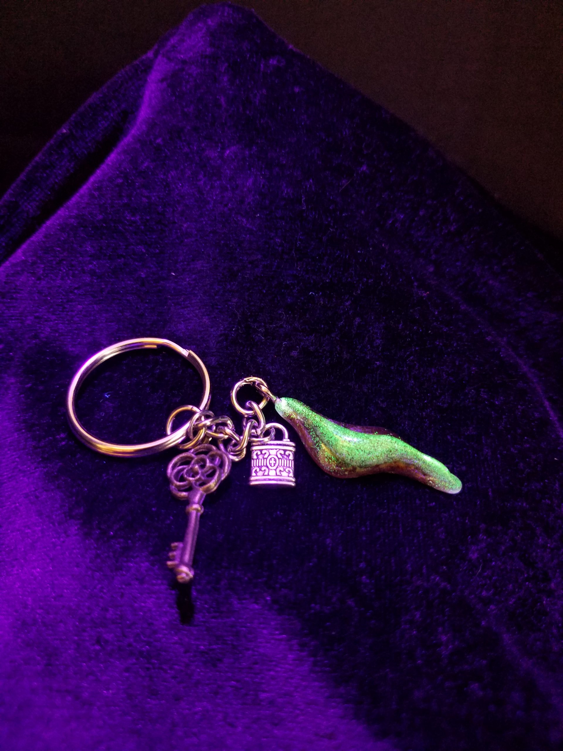 Abstract Green Glow & Brown Epoxy Wave Charm Keychain with Silver Lock & Bronze Key Charms